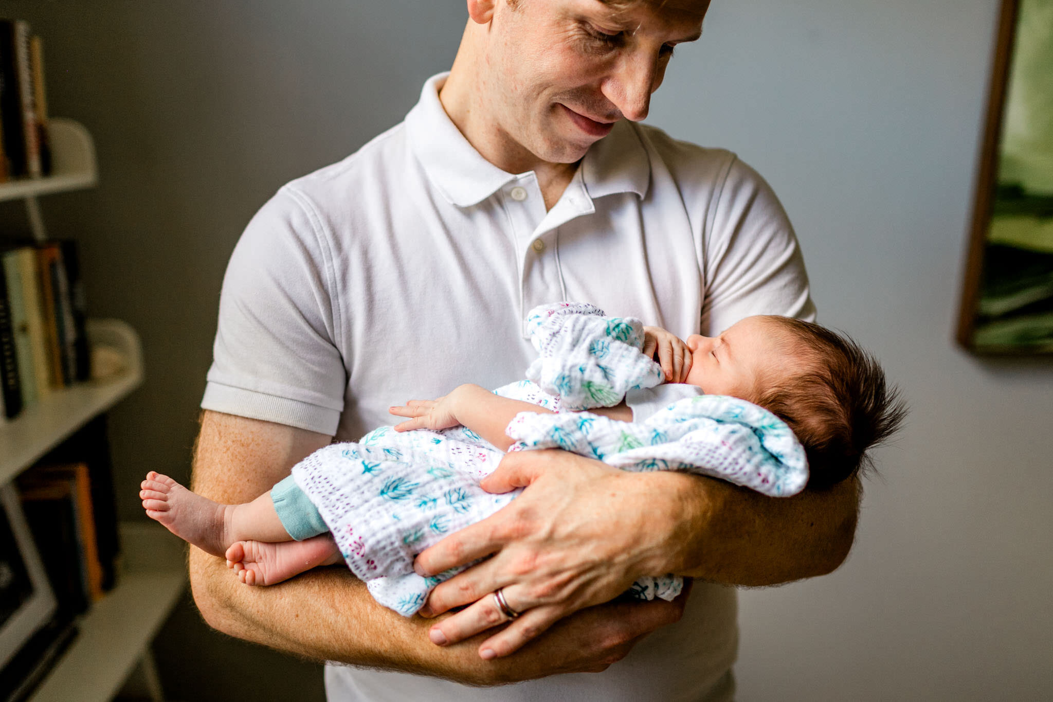 Raleigh Newborn Photographer | By G. Lin Photography | Father holding baby by window