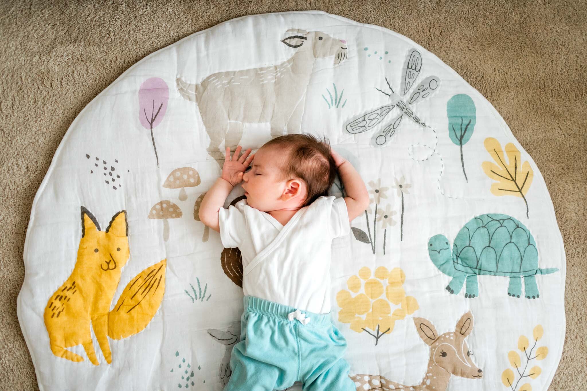 Raleigh Newborn Photographer | By G. Lin Photography | Baby sleeping on floor