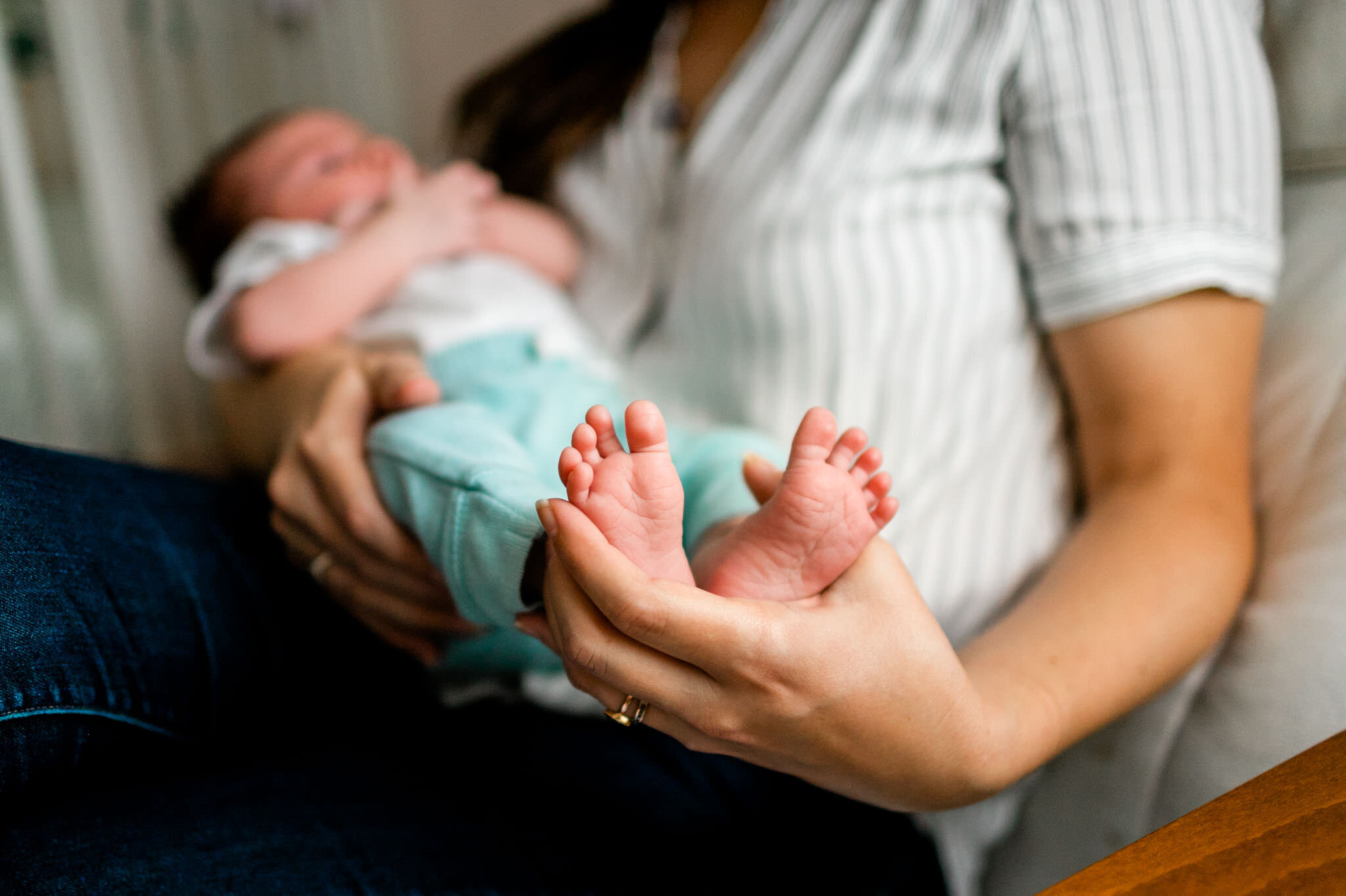 Raleigh Newborn Photographer | By G. Lin Photography | Mother holding baby 