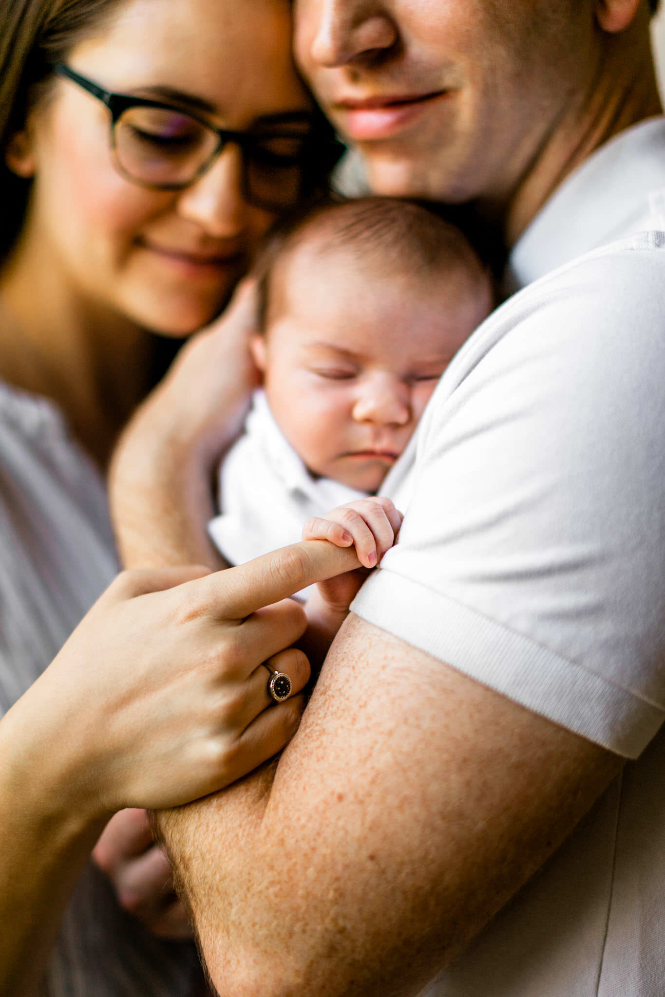 Raleigh Newborn Photographer | By G. Lin Photography | Mother holding baby's hands