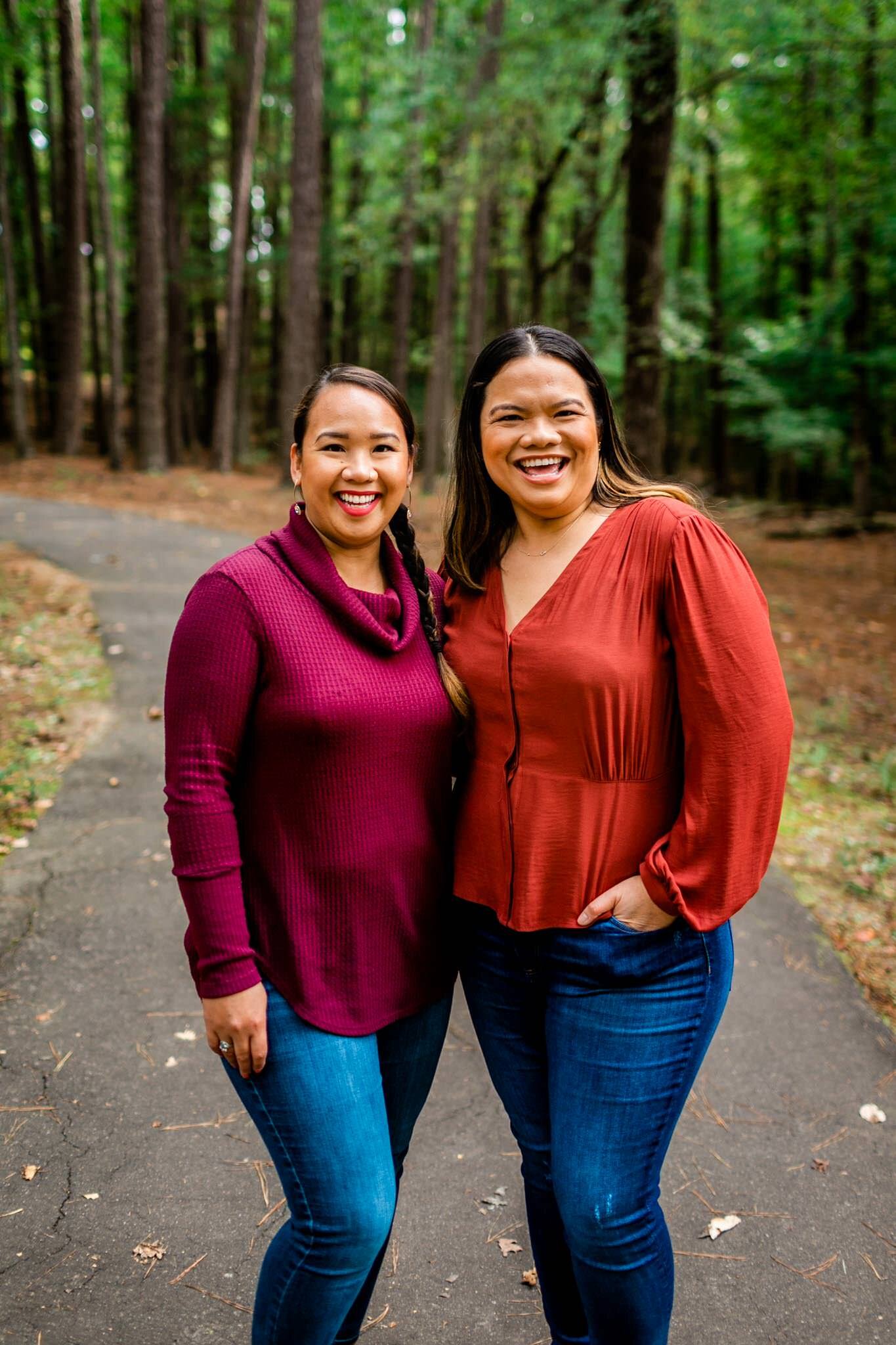 Raleigh Family Photographer | By G. Lin Photography | Umstead Park | Candid photo of two sisters