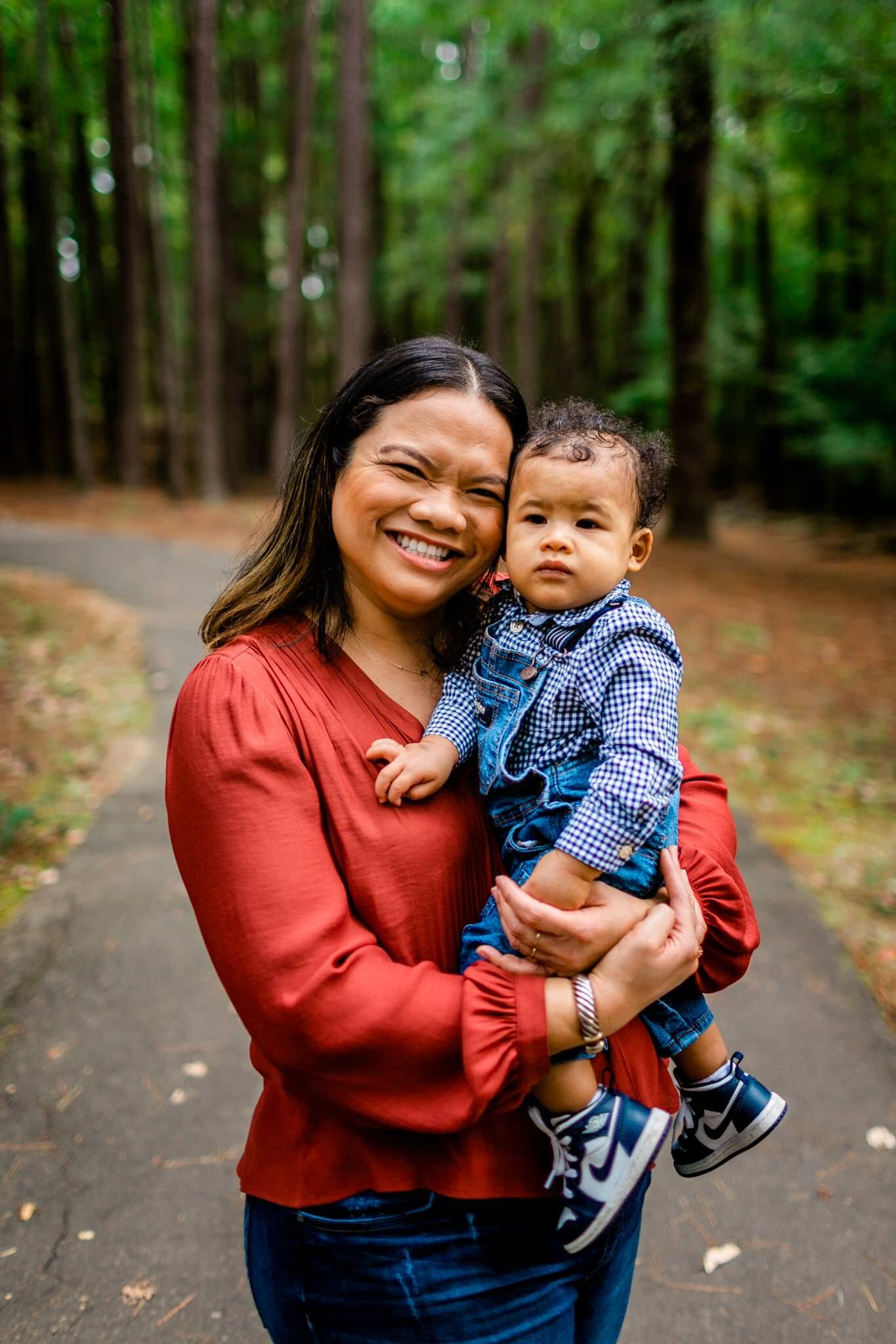 Raleigh Family Photographer | By G. Lin Photography | Umstead Park | Mother holding son in arms