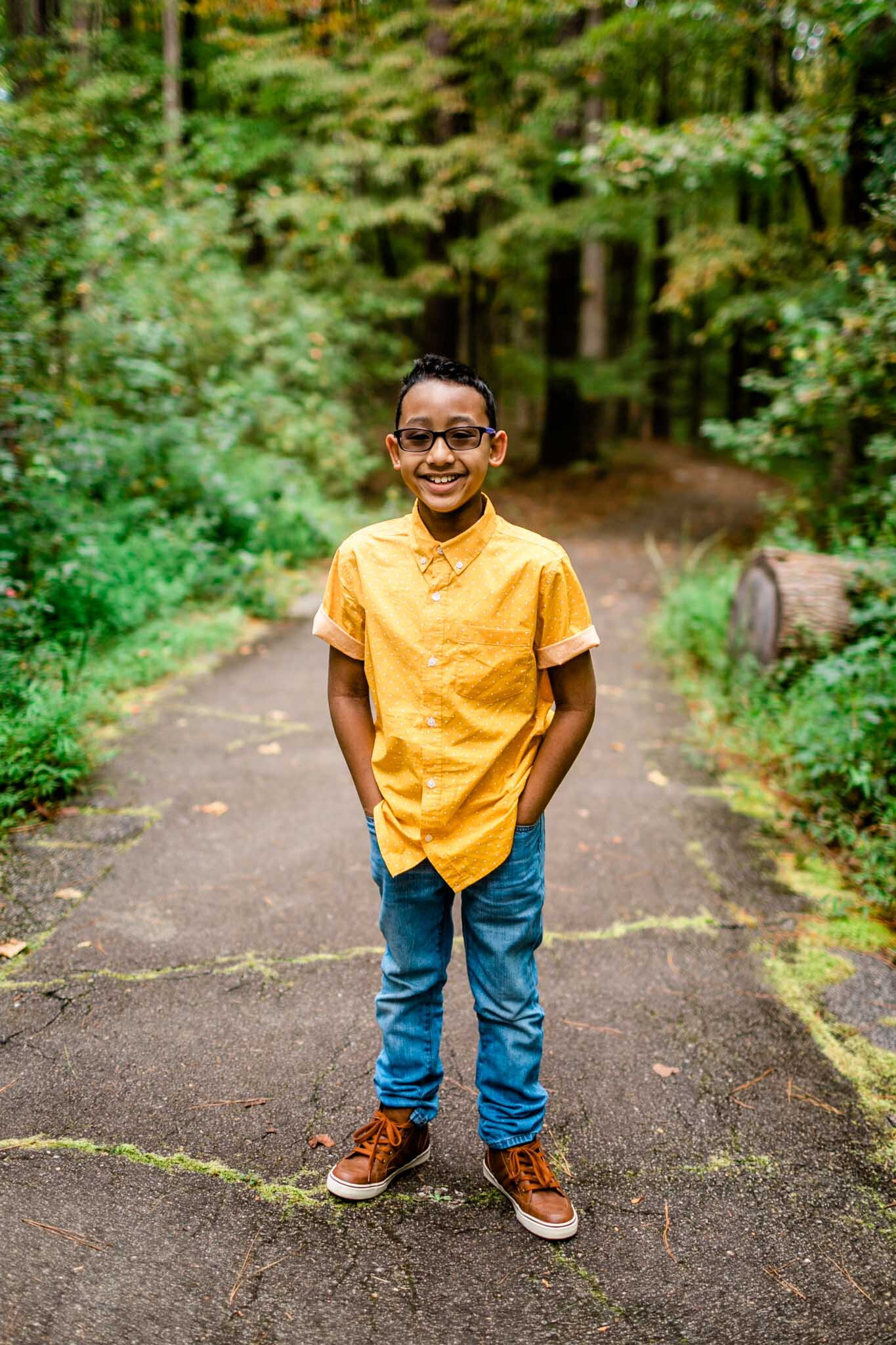 Raleigh Family Photographer | By G. Lin Photography | Umstead Park | Young boy smiling at camera