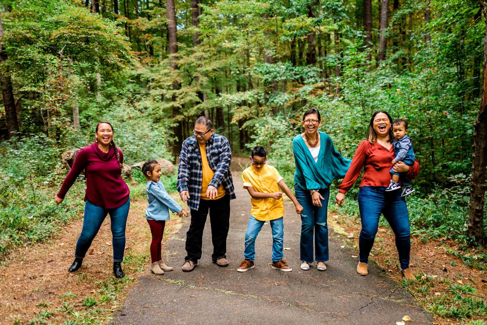 Raleigh Family Photographer | By G. Lin Photography | Umstead Park | Candid photo of family dancing