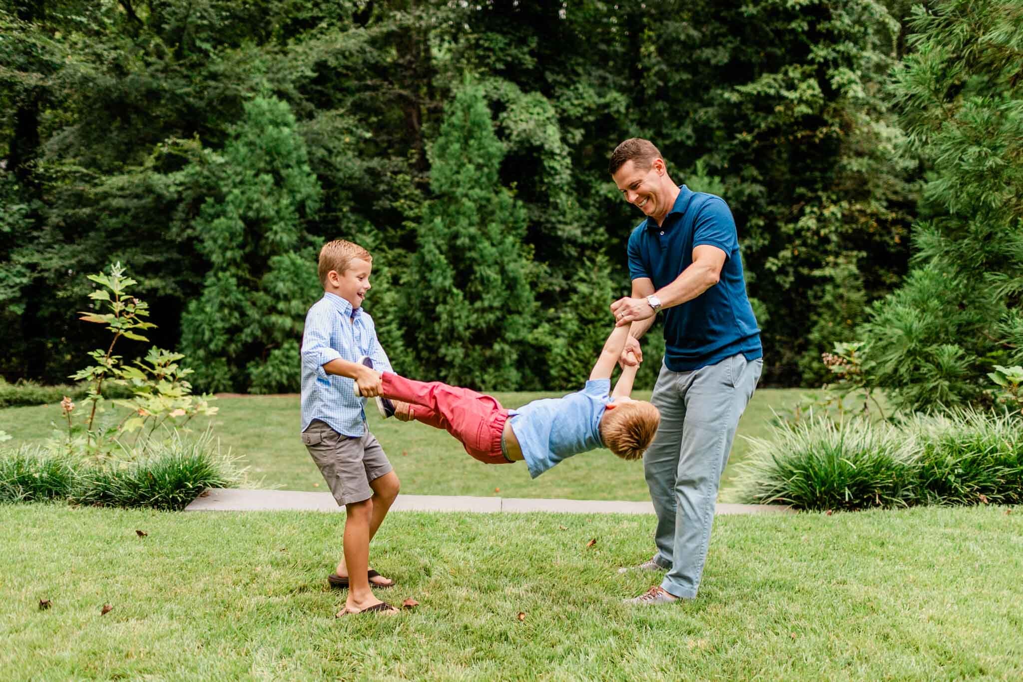 Raleigh Family Photographer | By G. Lin Photography | Dad with two boys playing outside