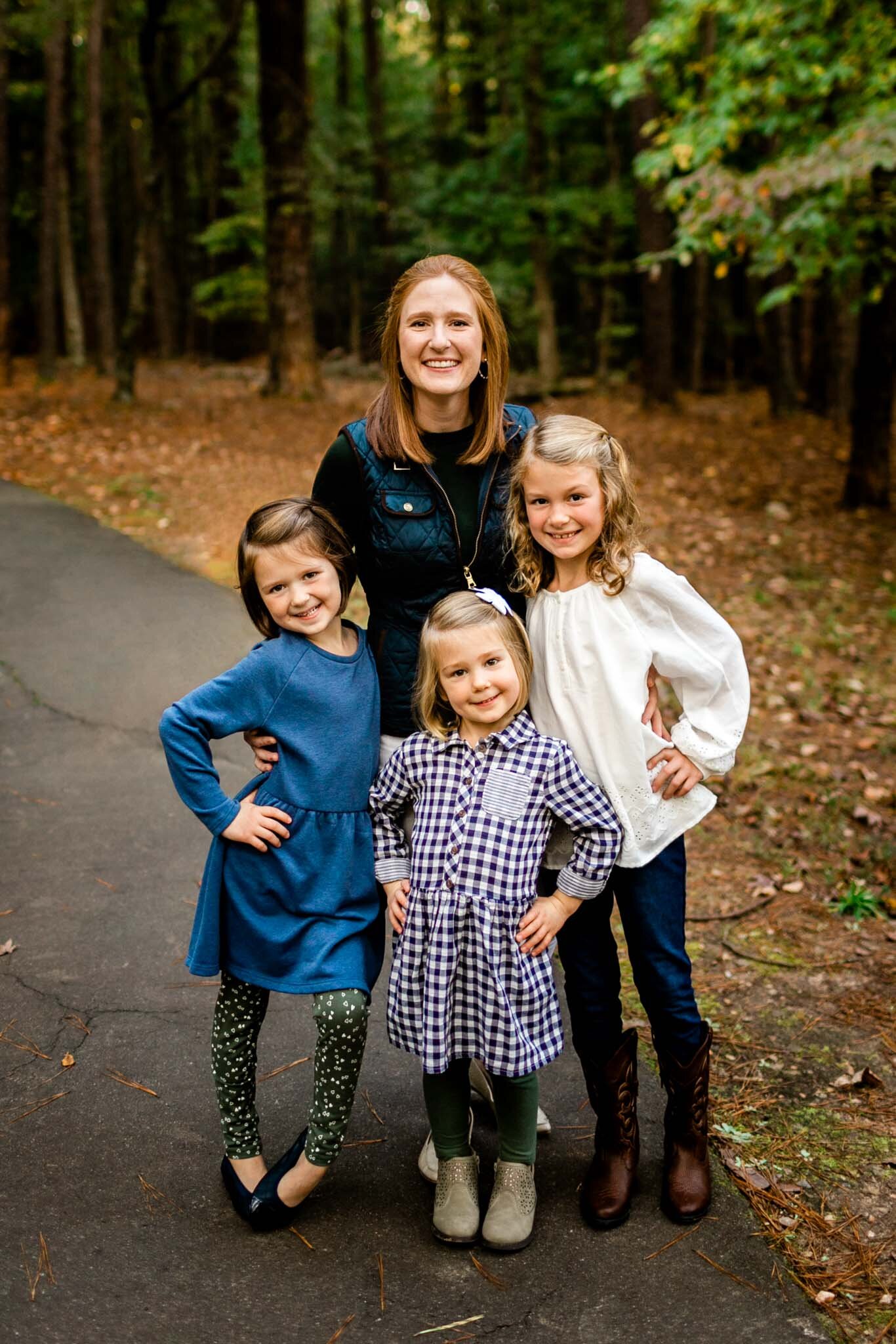 Raleigh Family Photographer | Umstead Park | By G. Lin Photography | Mother standing with arms around three daughters