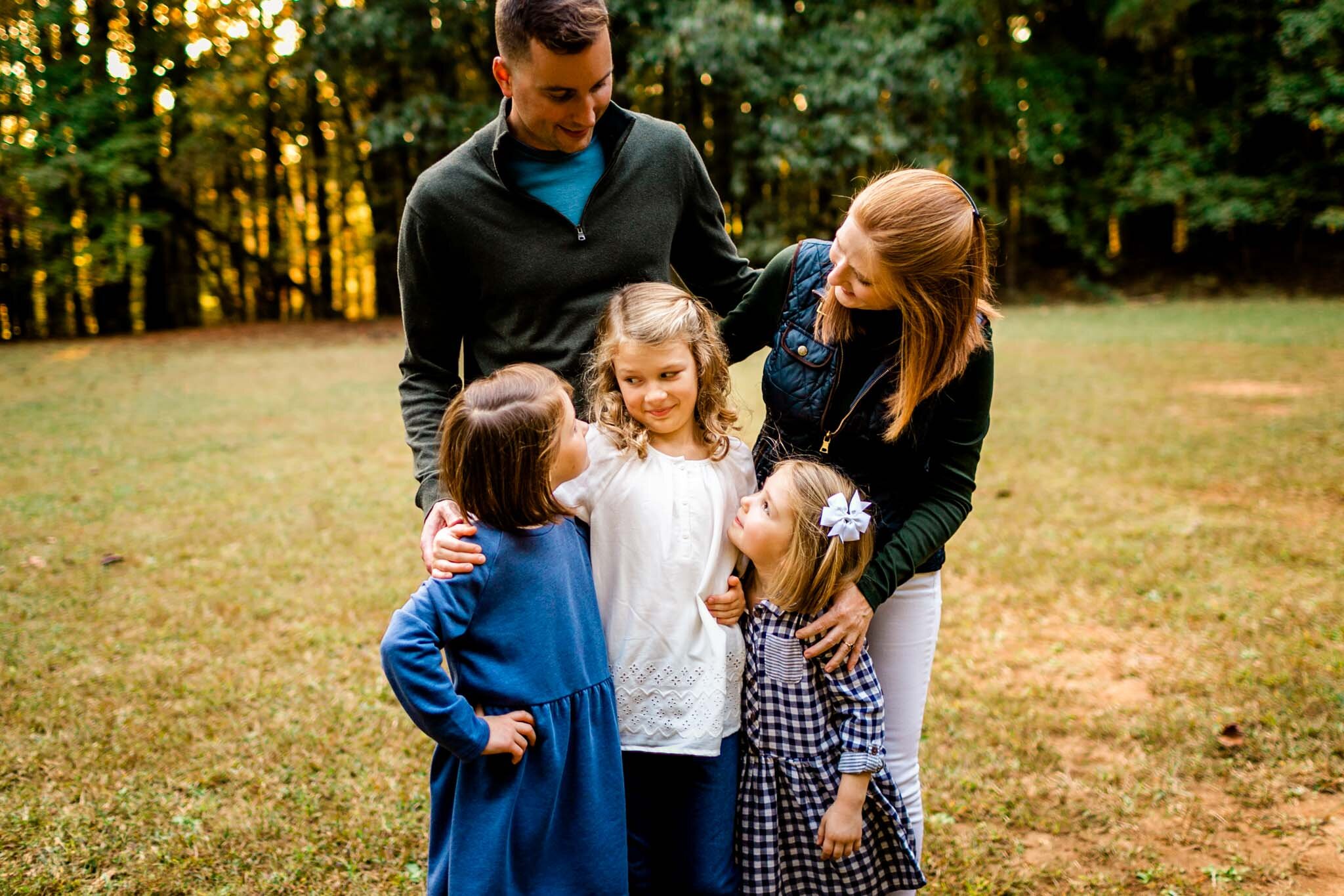 Raleigh Family Photographer | Umstead Park | By G. Lin Photography | Candid family photo outdoors