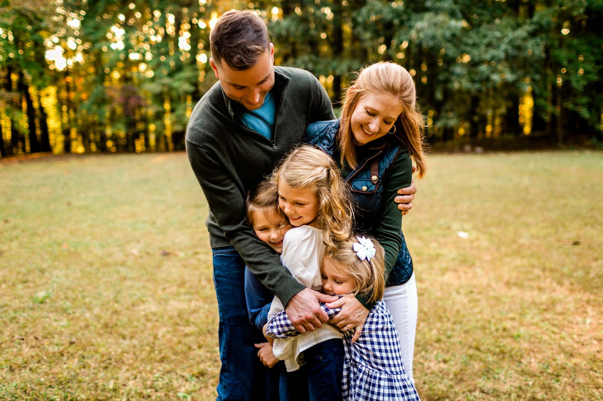 Raleigh Family Photographer | Umstead Park | By G. Lin Photography | Group family hug