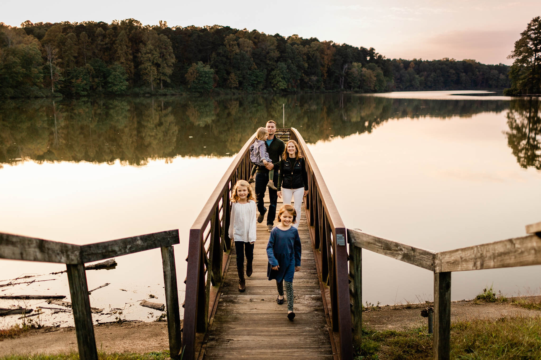 Raleigh Family Photographer | Umstead Park | By G. Lin Photography | Family walking on bridge