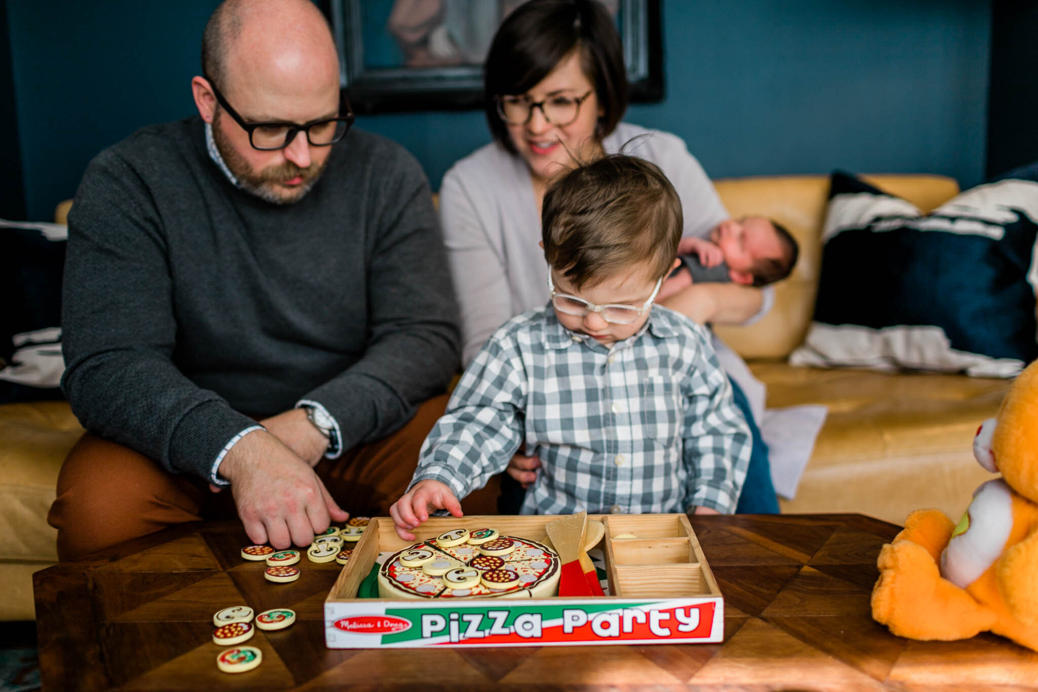 Raleigh Lifestyle Family Photographer | By G. Lin Photography | Boy playing with pizza toy