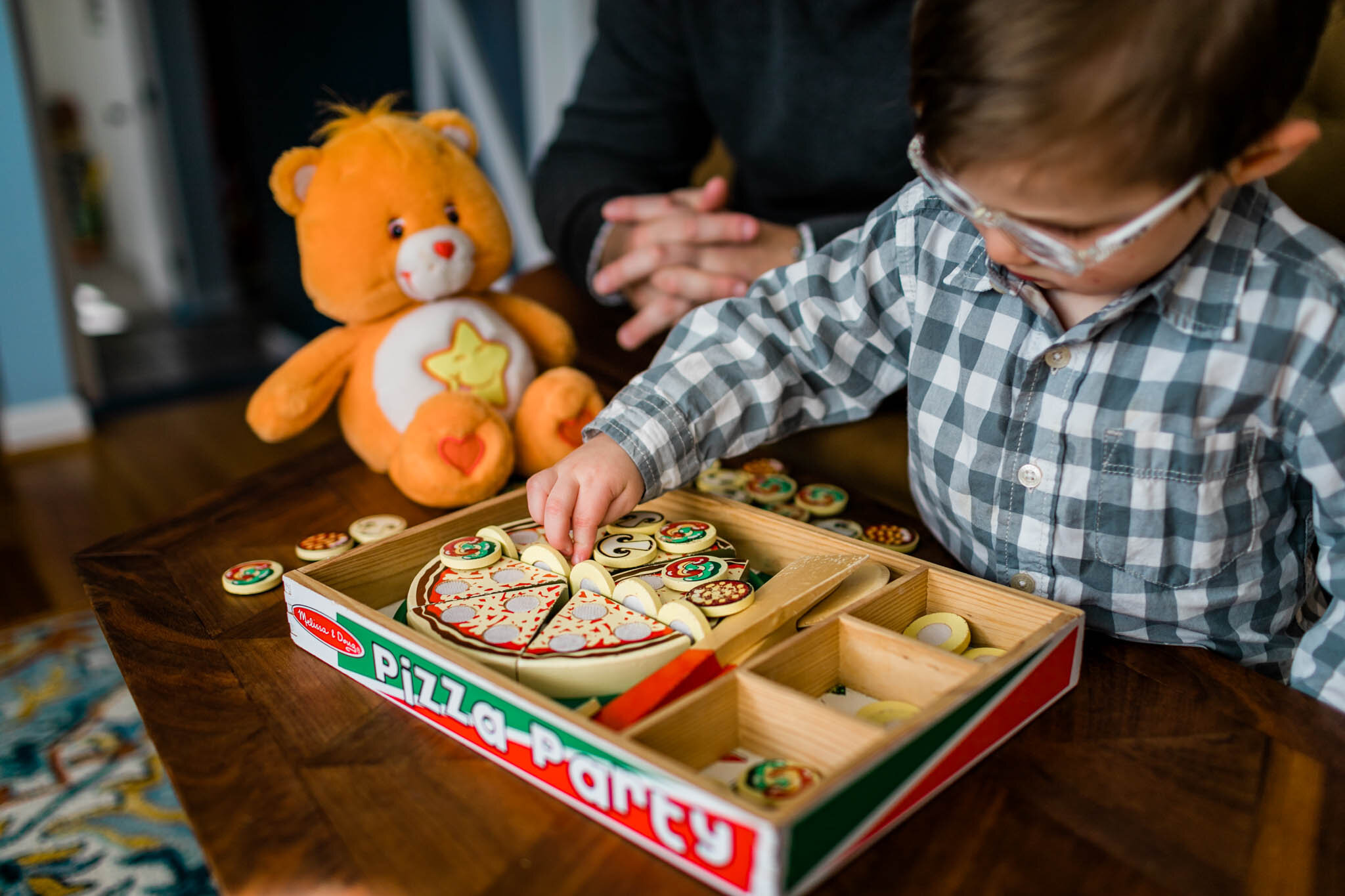 Raleigh Lifestyle Family Photographer | By G. Lin Photography | Young boy holding toy