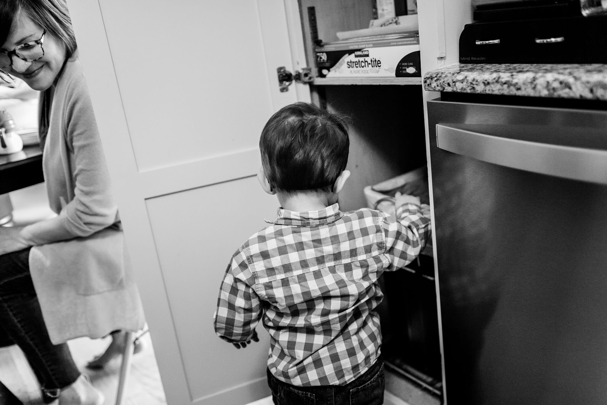 Raleigh Lifestyle Family Photographer | By G. Lin Photography | Young boy throwing away garbage