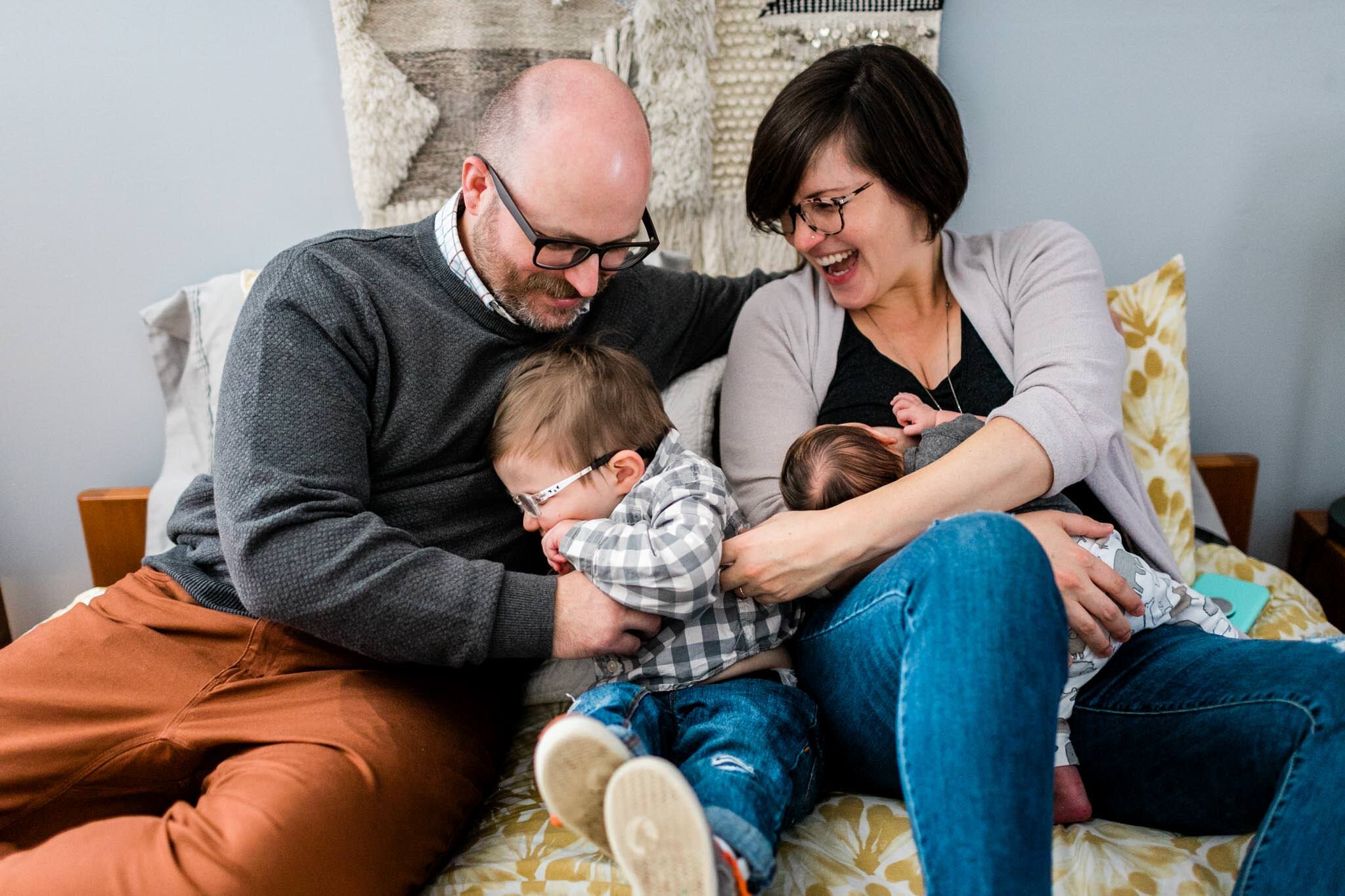 Raleigh Lifestyle Family Photographer | By G. Lin Photography | Candid family photo parents tickling toddler