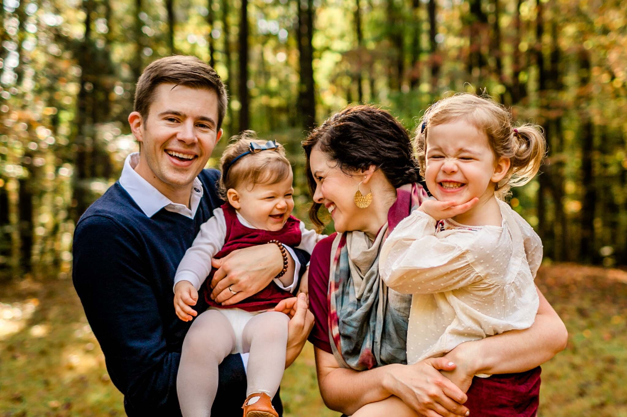 Raleigh Family Photographer | By G. Lin Photography | Umstead Park | Parents holding children and smiling