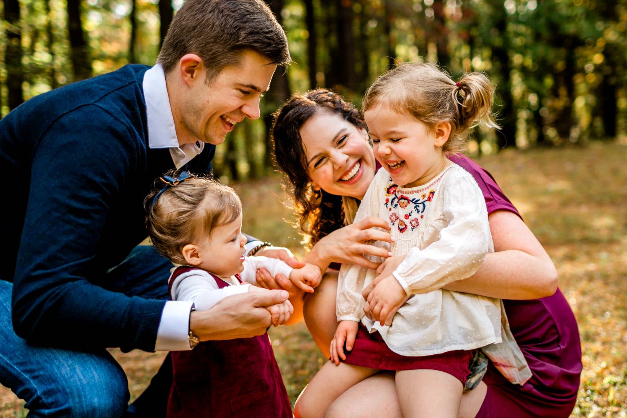 Raleigh Family Photographer | By G. Lin Photography | Umstead Park | Family laughing together outside