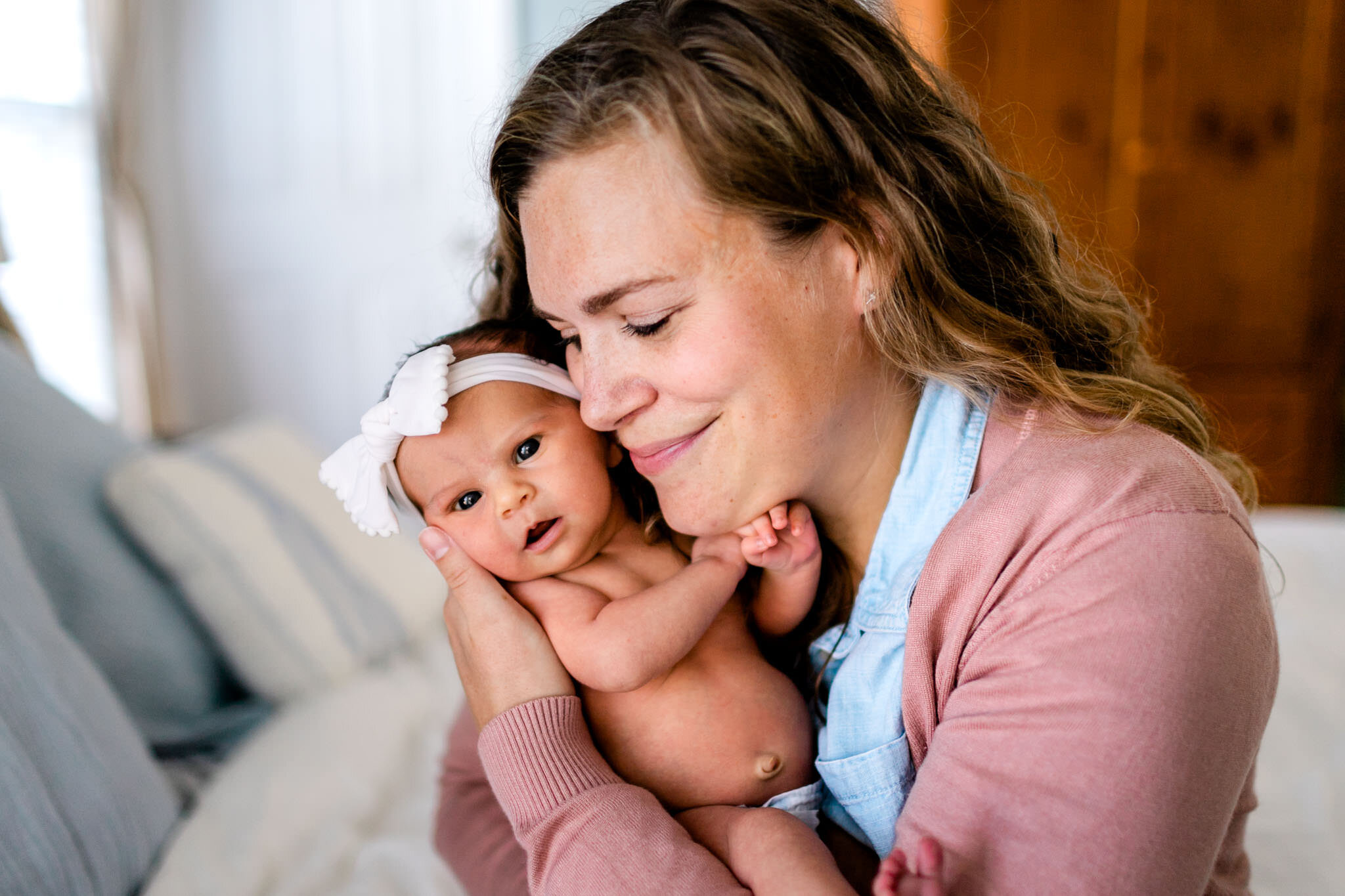 Raleigh Newborn Photographer | By G. Lin Photography | Mother holding baby girl