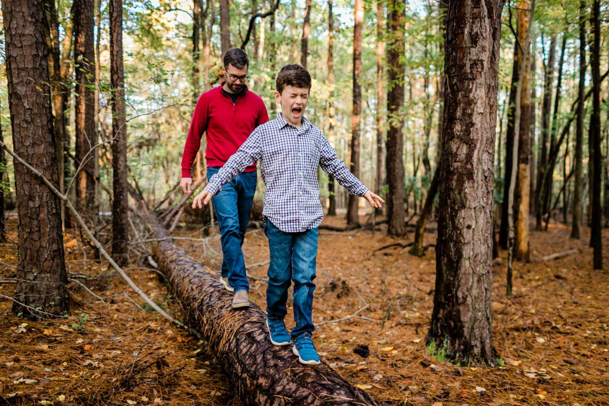 Raleigh Family Photographer | By G. Lin Photography | Umstead Park | Young boy walking on log