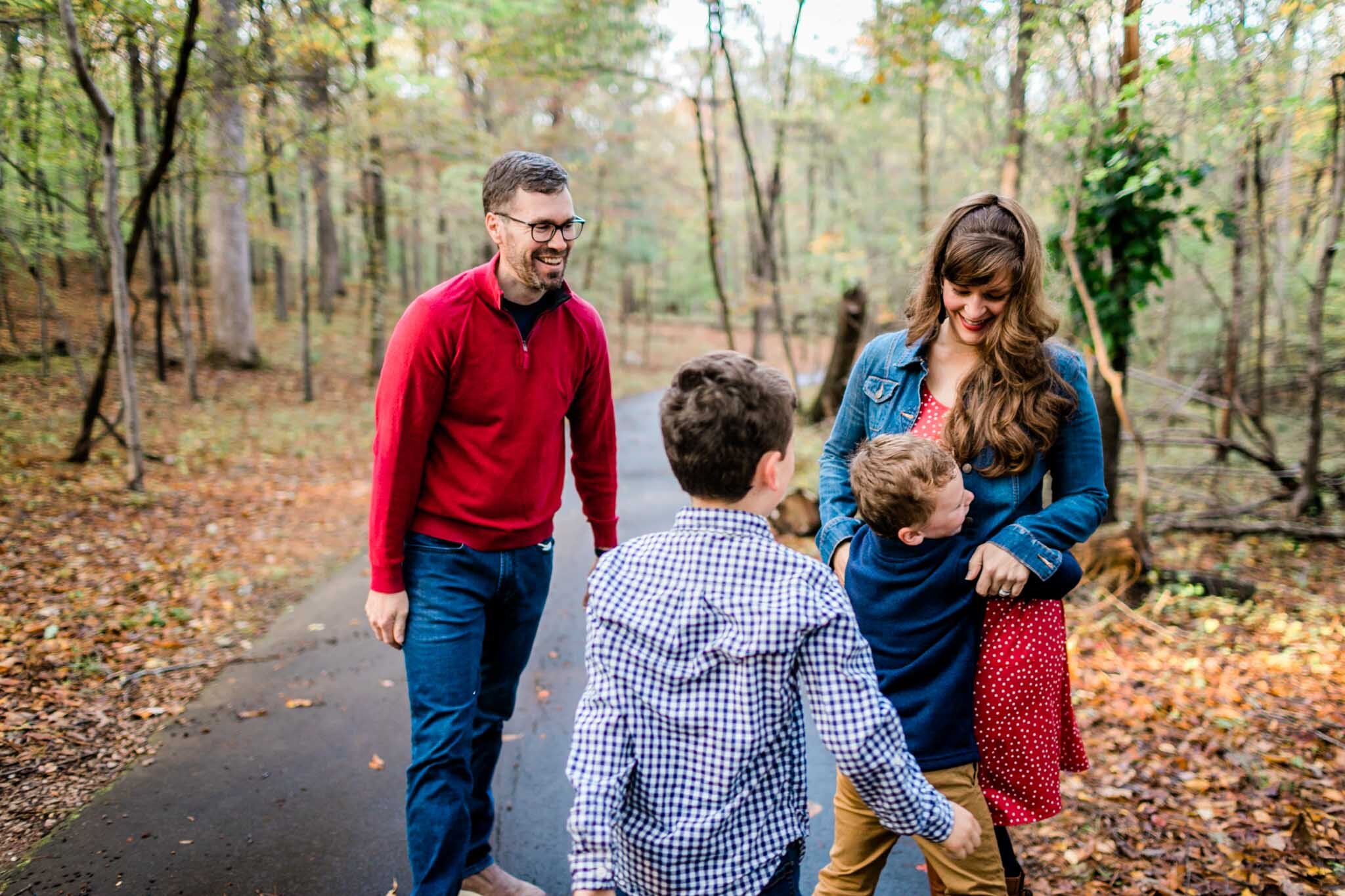 Raleigh Family Photographer | By G. Lin Photography | Umstead Park | Family playing with one another