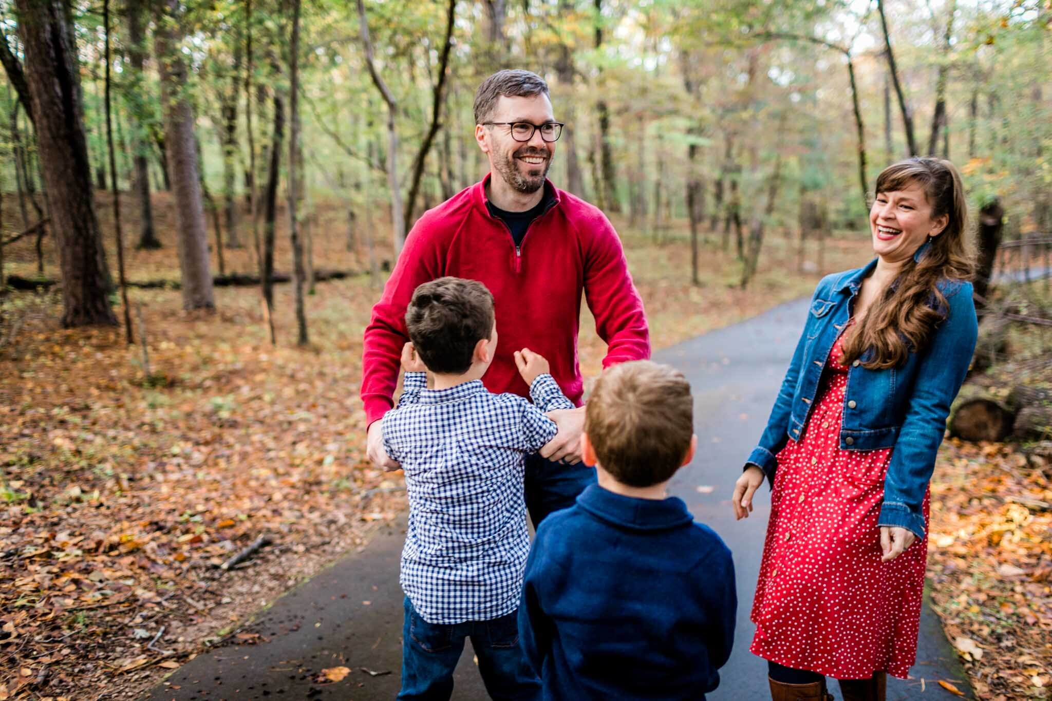 Raleigh Family Photographer | By G. Lin Photography | Umstead Park | Family laughing together and playing outside