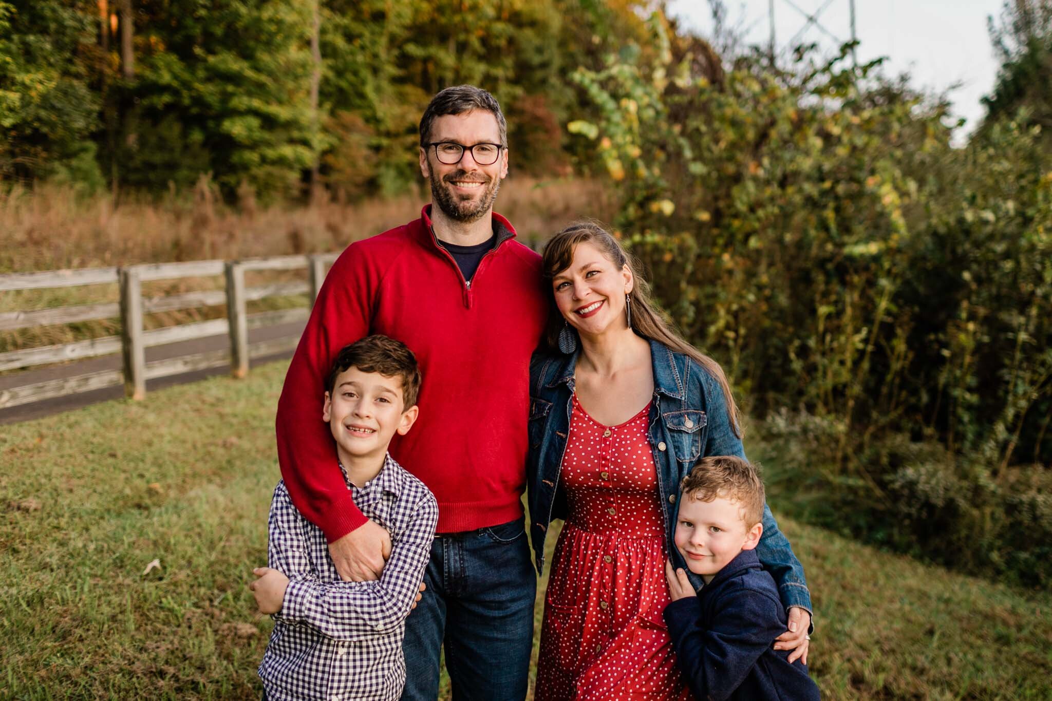 Raleigh Family Photographer | By G. Lin Photography | Umstead Park | Fall family portrait outside | Red and navy outfit