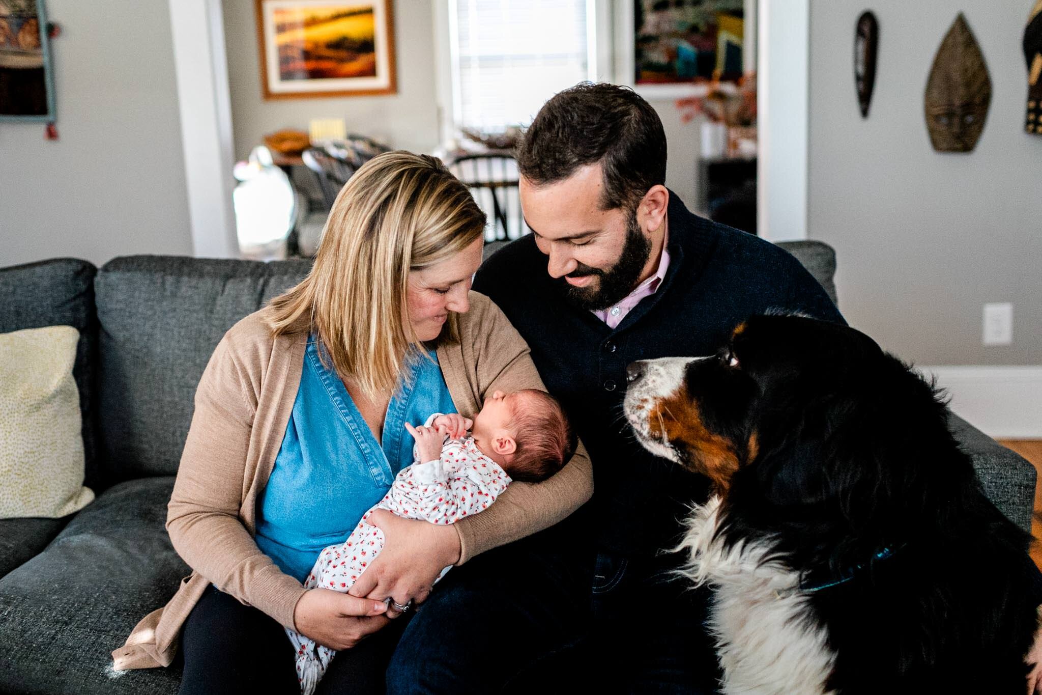 Durham Newborn Photographer | By G. Lin Photography | Family sitting on couch and smiling