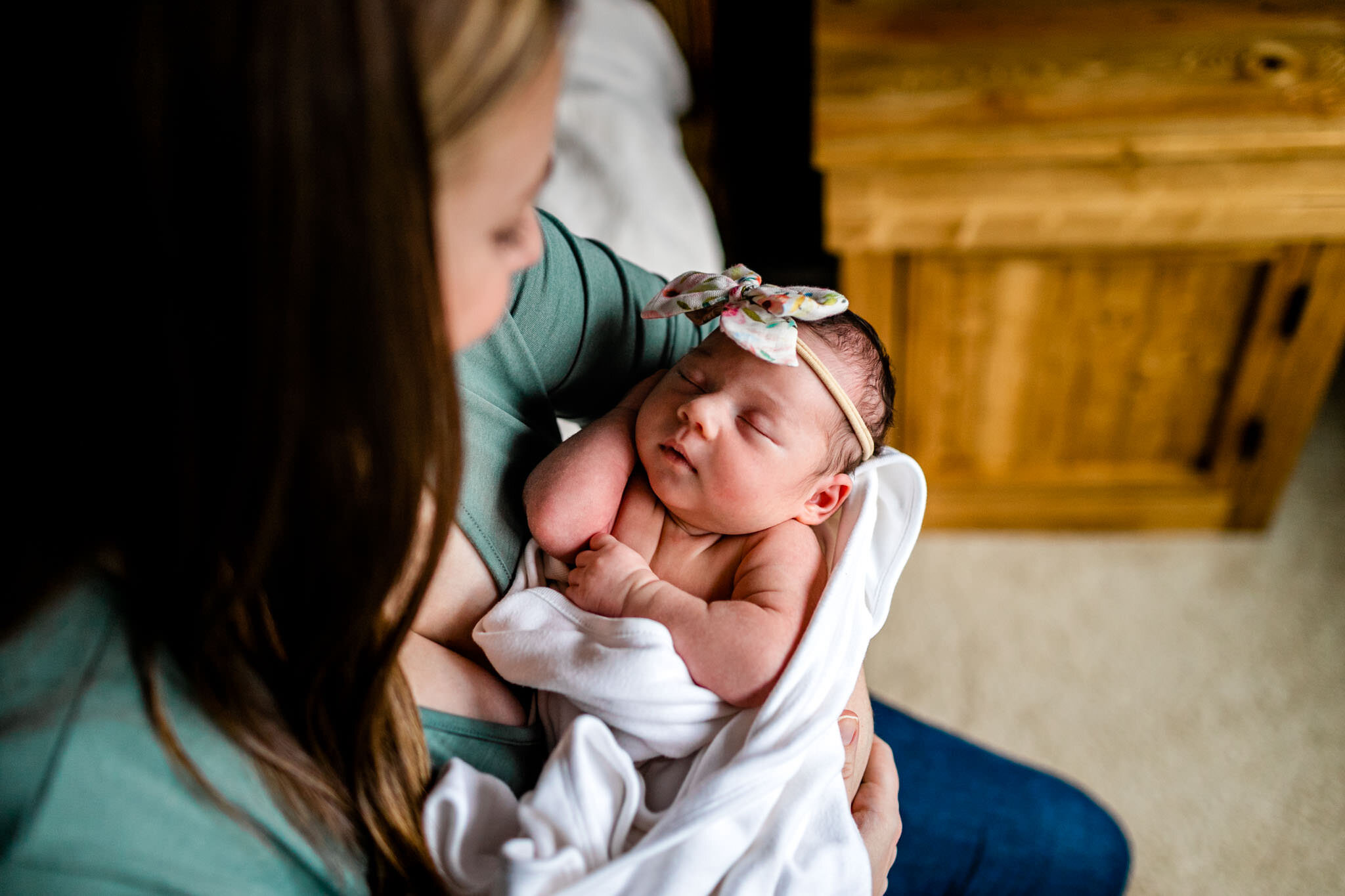 Durham Newborn Photographer | By G. Lin Photography | Mother holding newborn baby girl