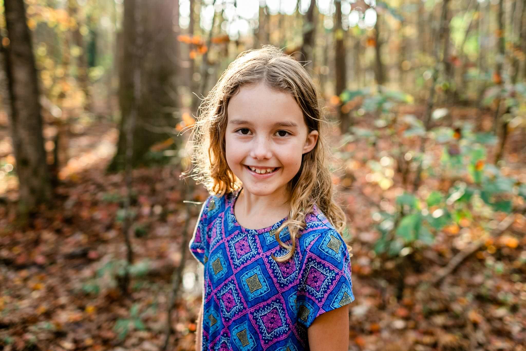 Apex Family Photographer | By G. Lin Photography | Young girl wearing purple dress