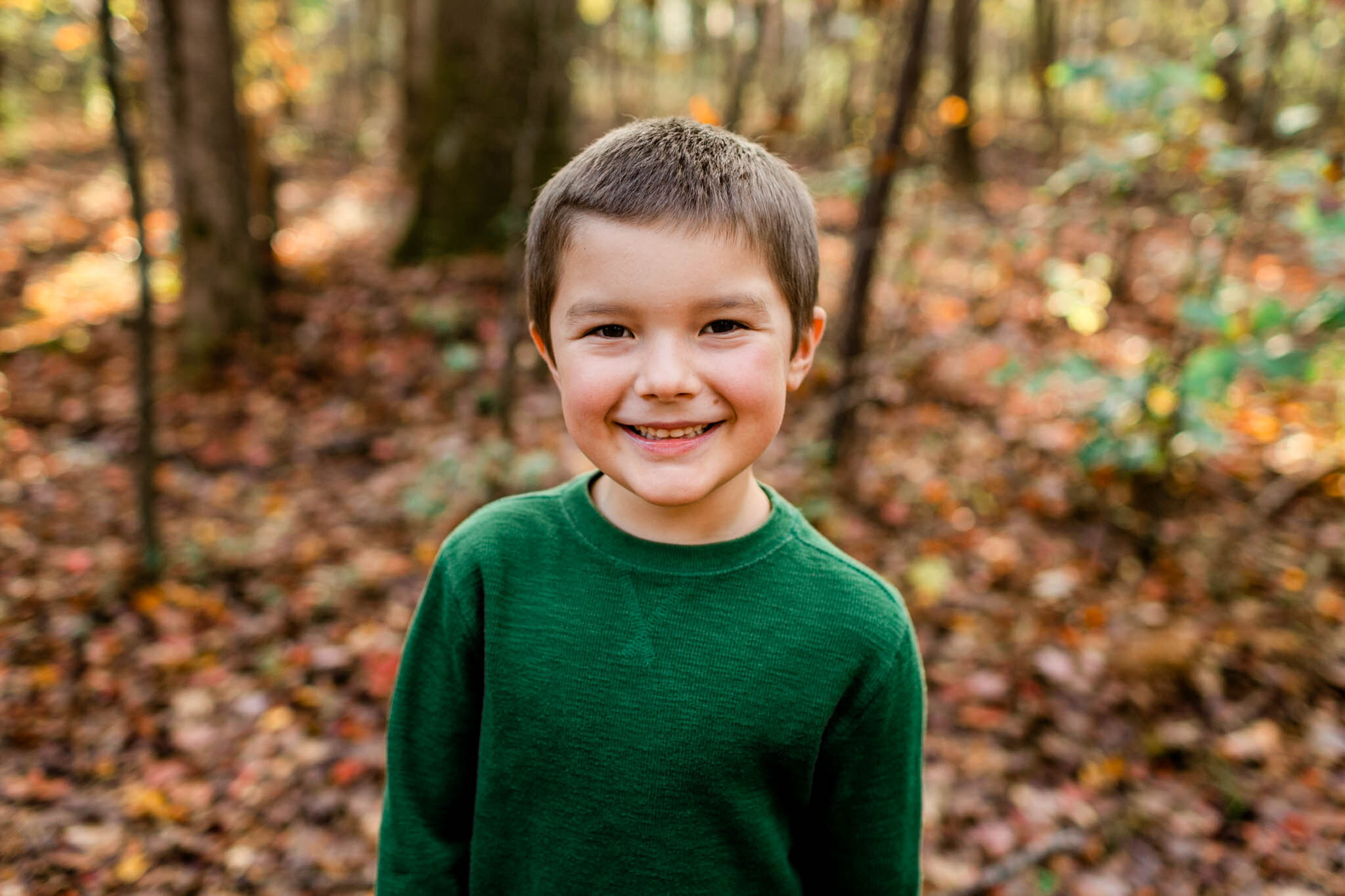 Apex Family Photographer | By G. Lin Photography | Young boy wearing green shirt