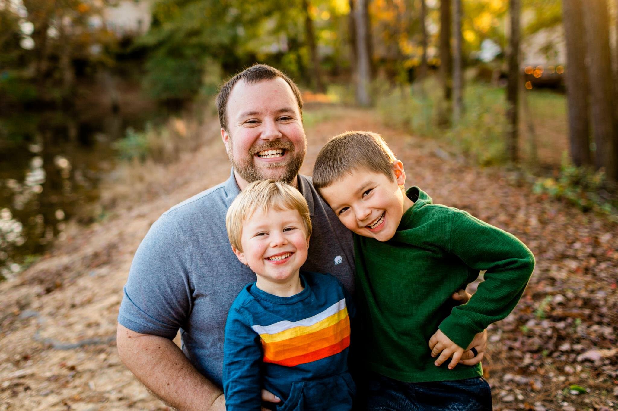 Apex Family Photographer | By G. Lin Photography | Dad smiling with two boys