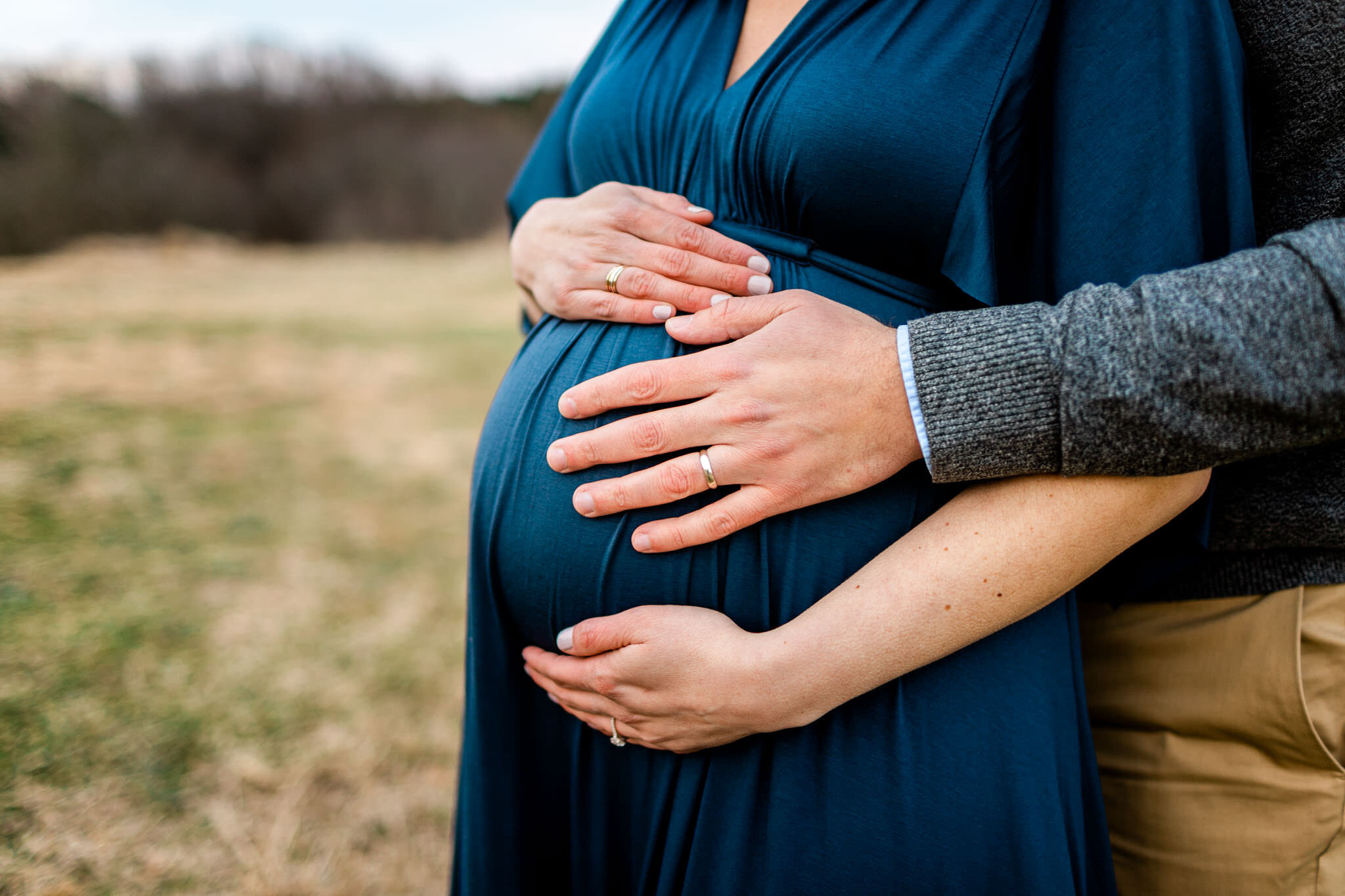 Raleigh Newborn Photographer | By G. Lin Photography | Husband and wife's hands on belly