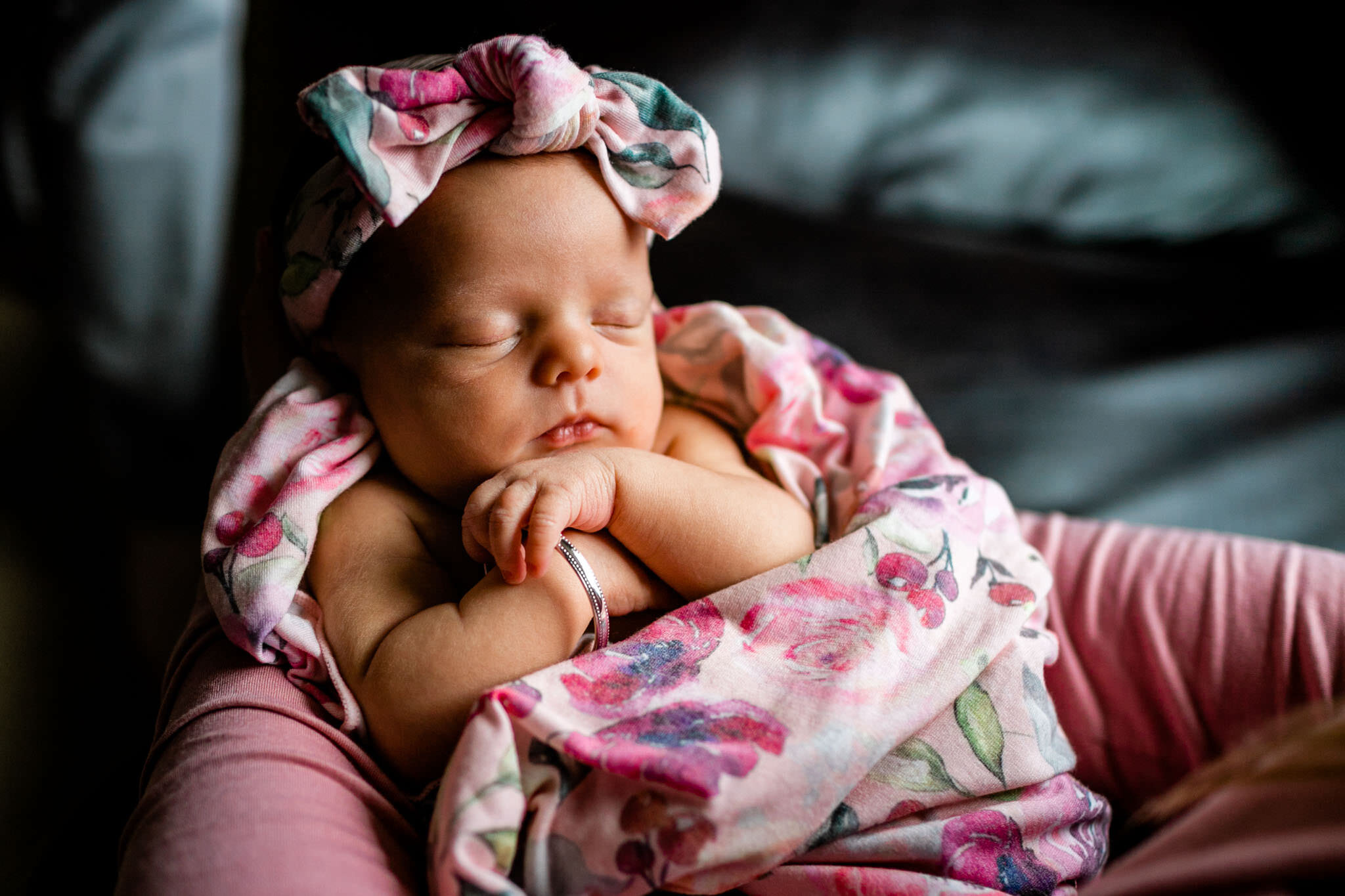 Raleigh Newborn Photographer | By G. Lin Photography | Close up of baby girl with bracelet