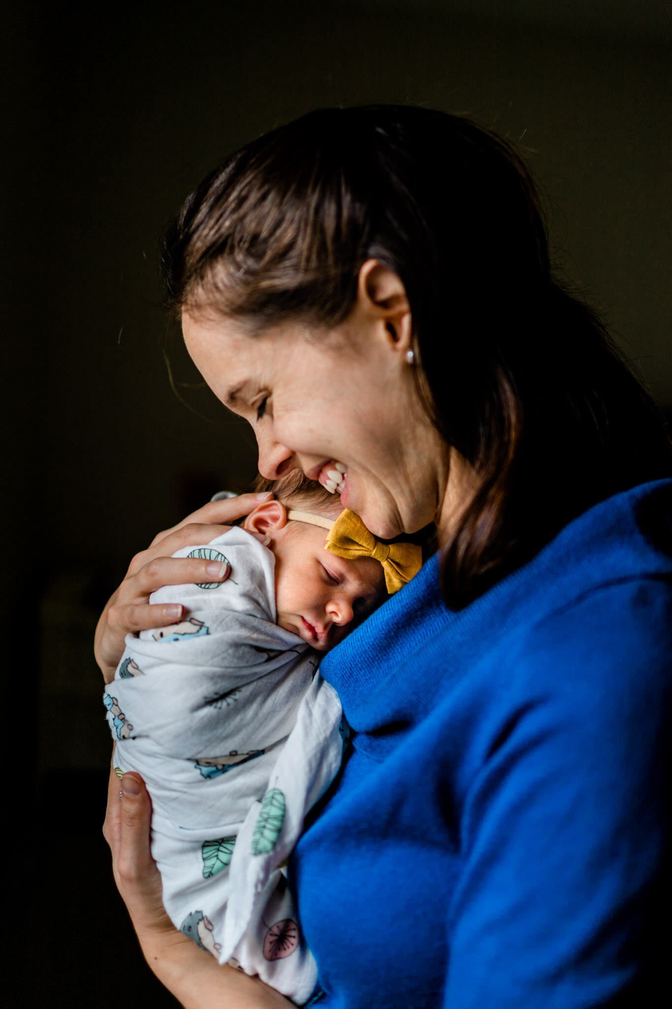 Durham Newborn Photographer | By G. Lin Photography | Mother holding baby girl 