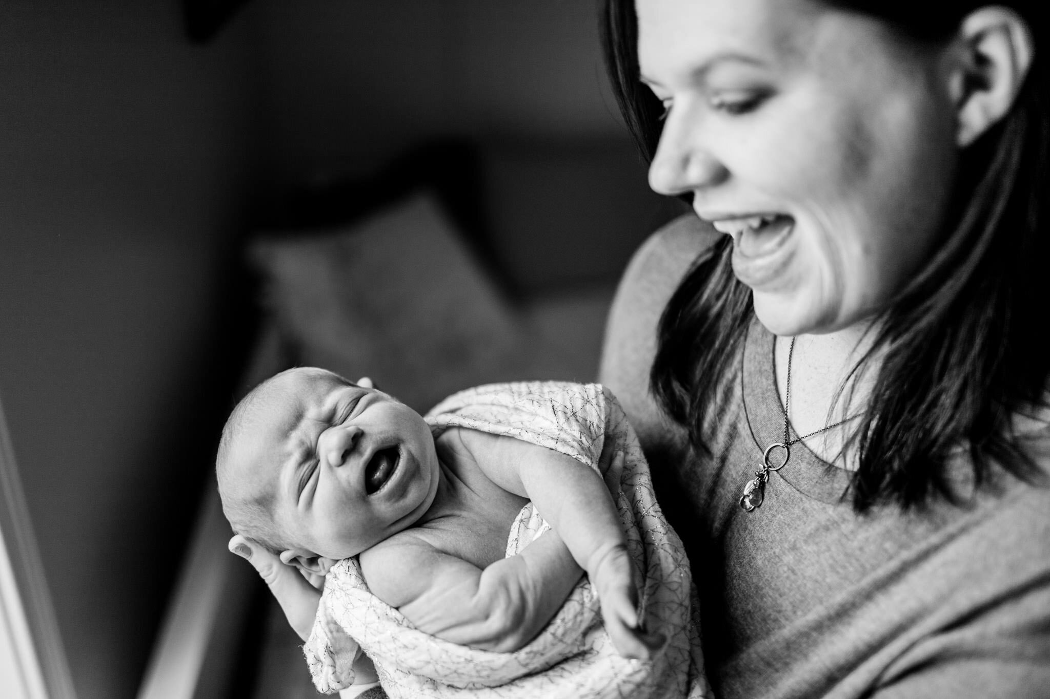 Hillsborough Newborn Photographer | By G. Lin Photography | Black and white photo of mom holding newborn baby girl