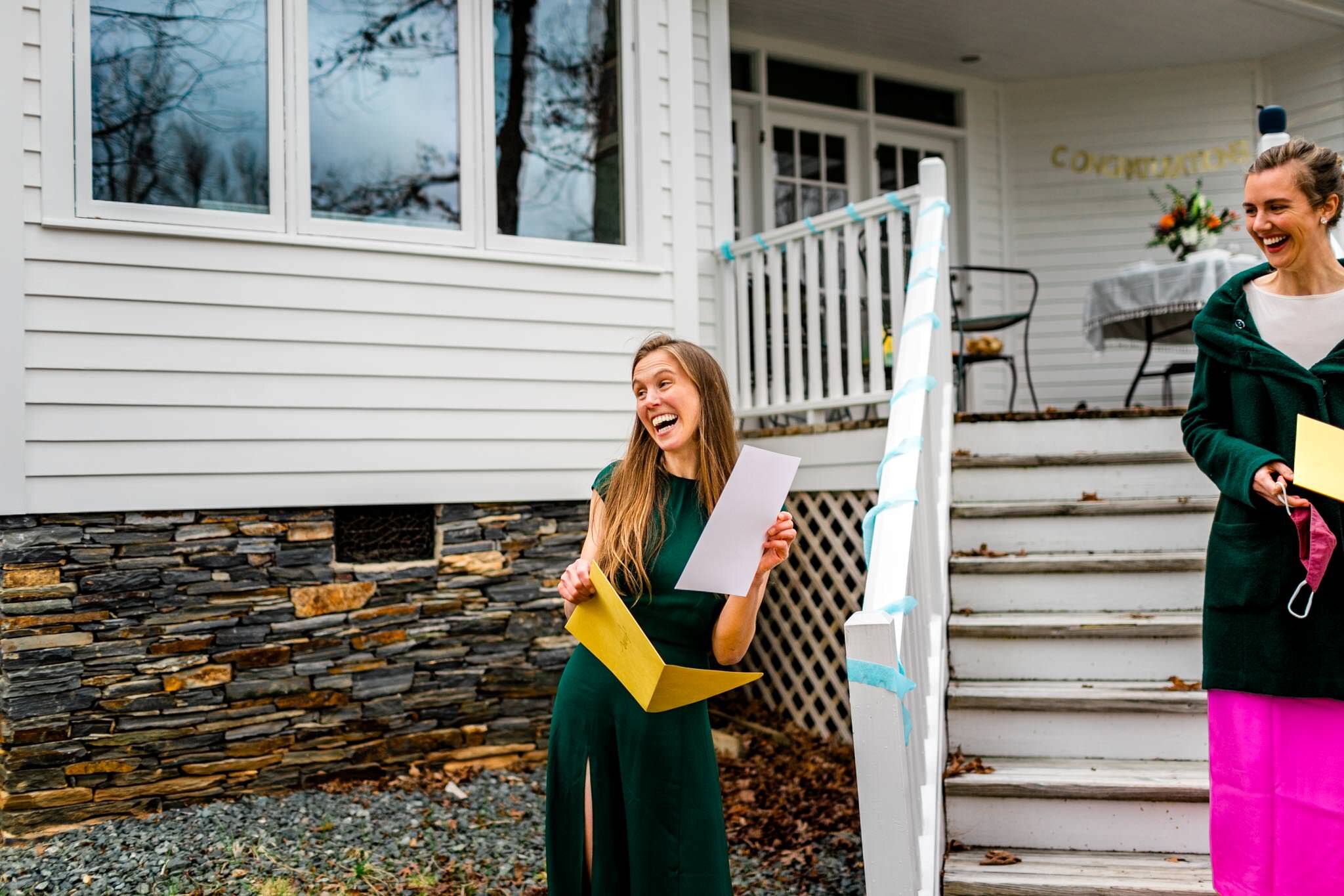 Durham Family Photographer | By G. Lin Photography | Match Day | Woman smiling and holding letter