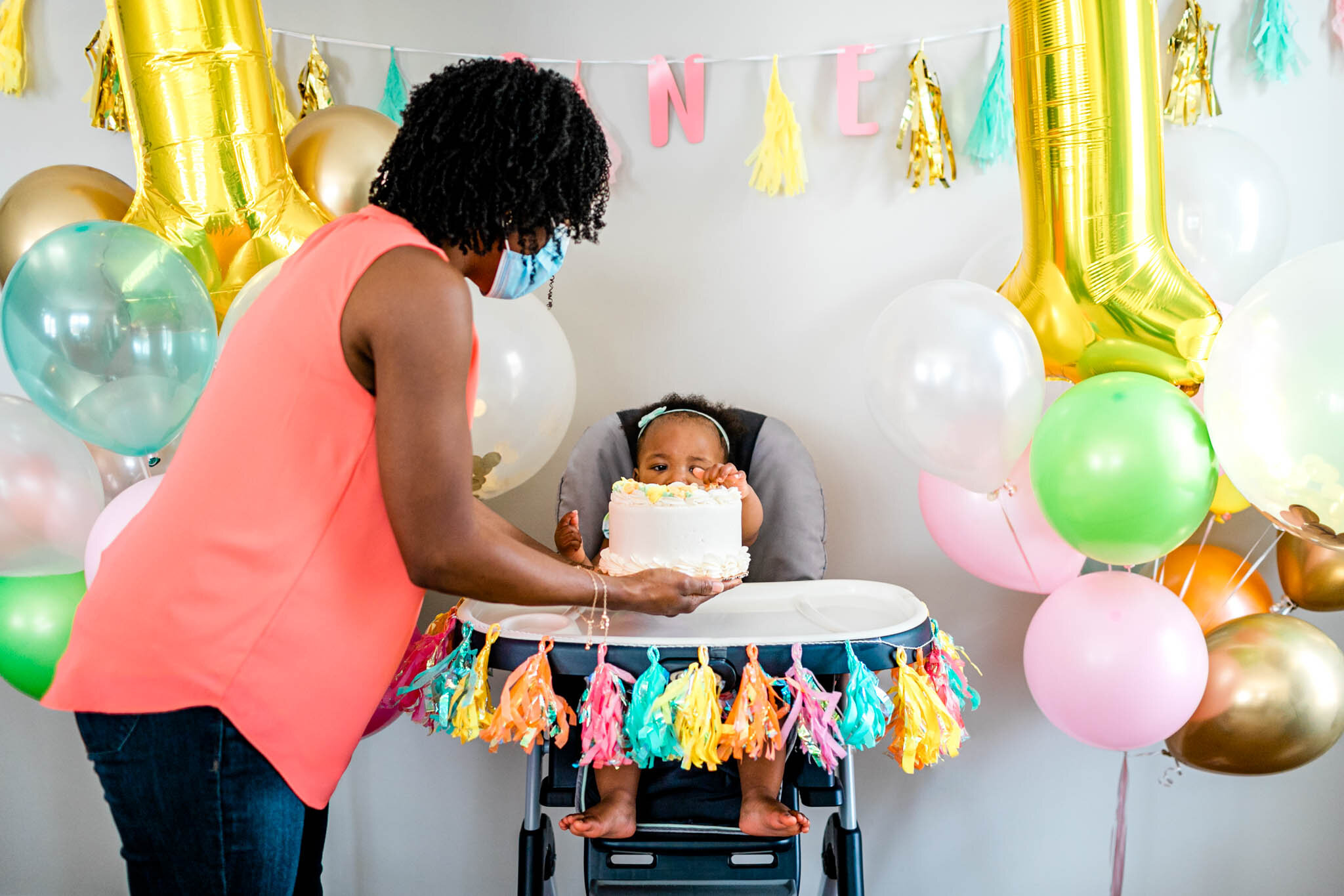 Durham Family Photographer | By G. Lin Photography | Woman serving cake to baby girl