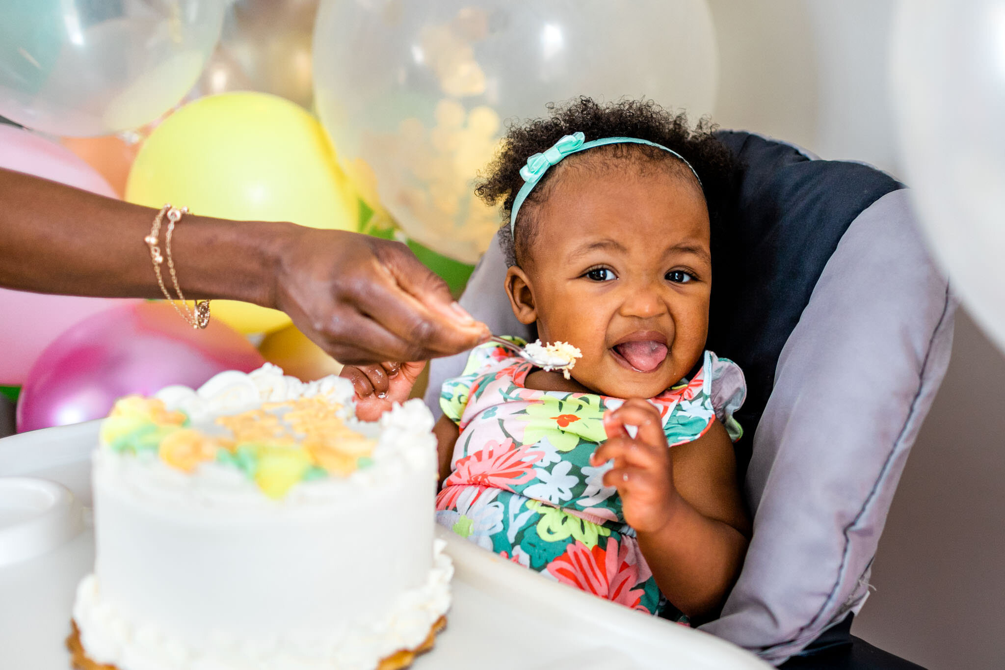 Durham Family Photographer | By G. Lin Photography | Baby girl turning away from cake