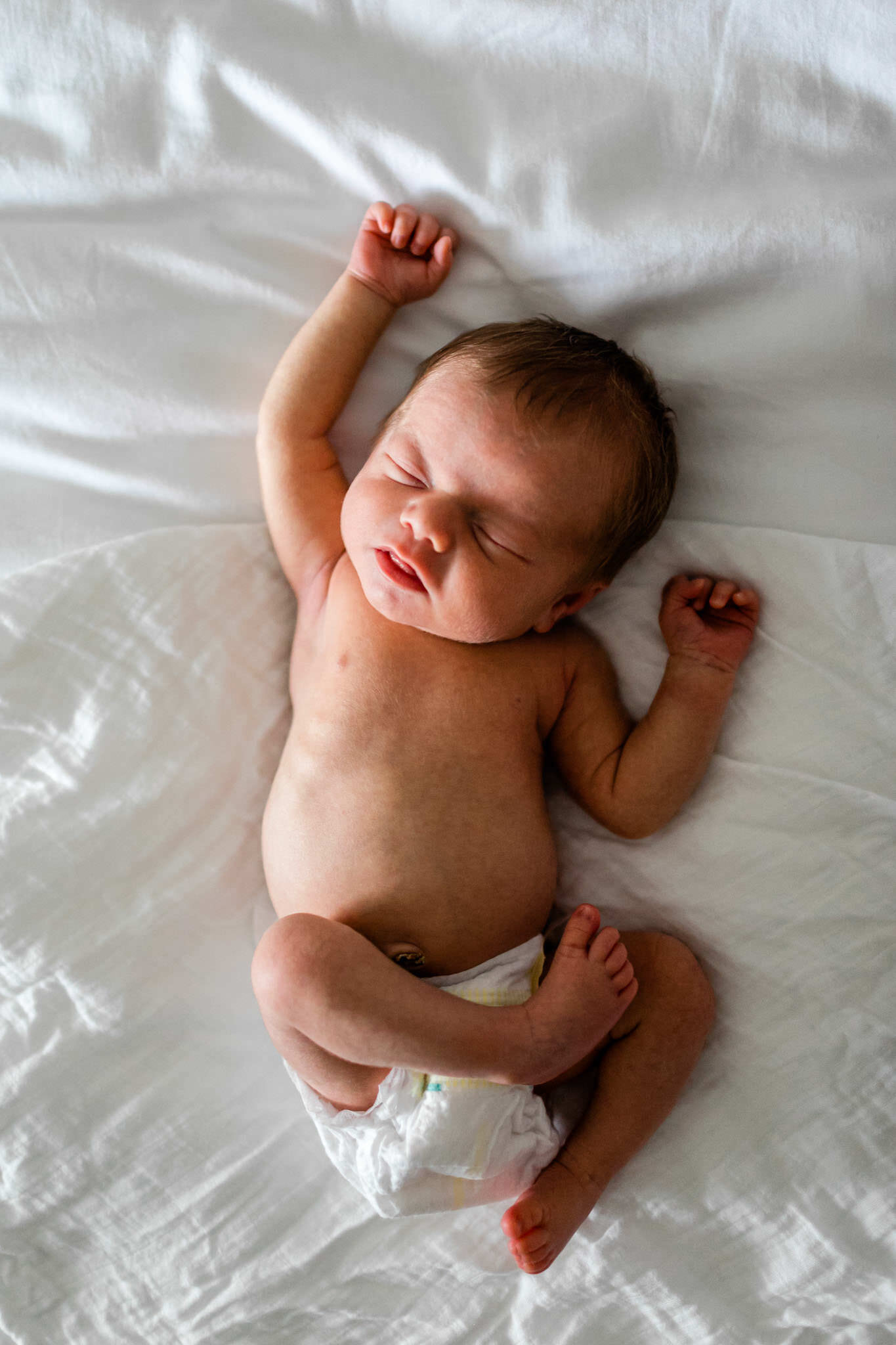 Durham Newborn Photographer | By G. Lin Photography | Baby sleeping on bed