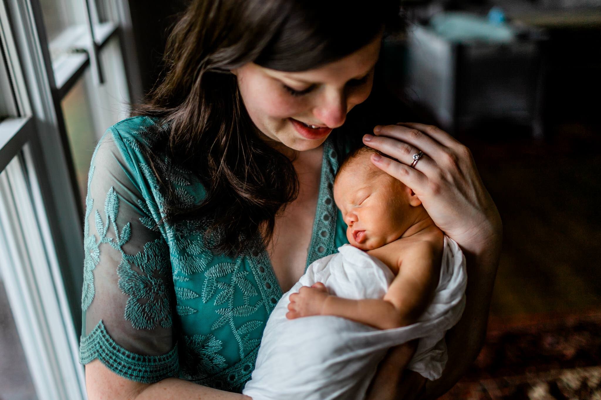 Durham Newborn Photographer | By G. Lin Photography | Mother holding baby boy