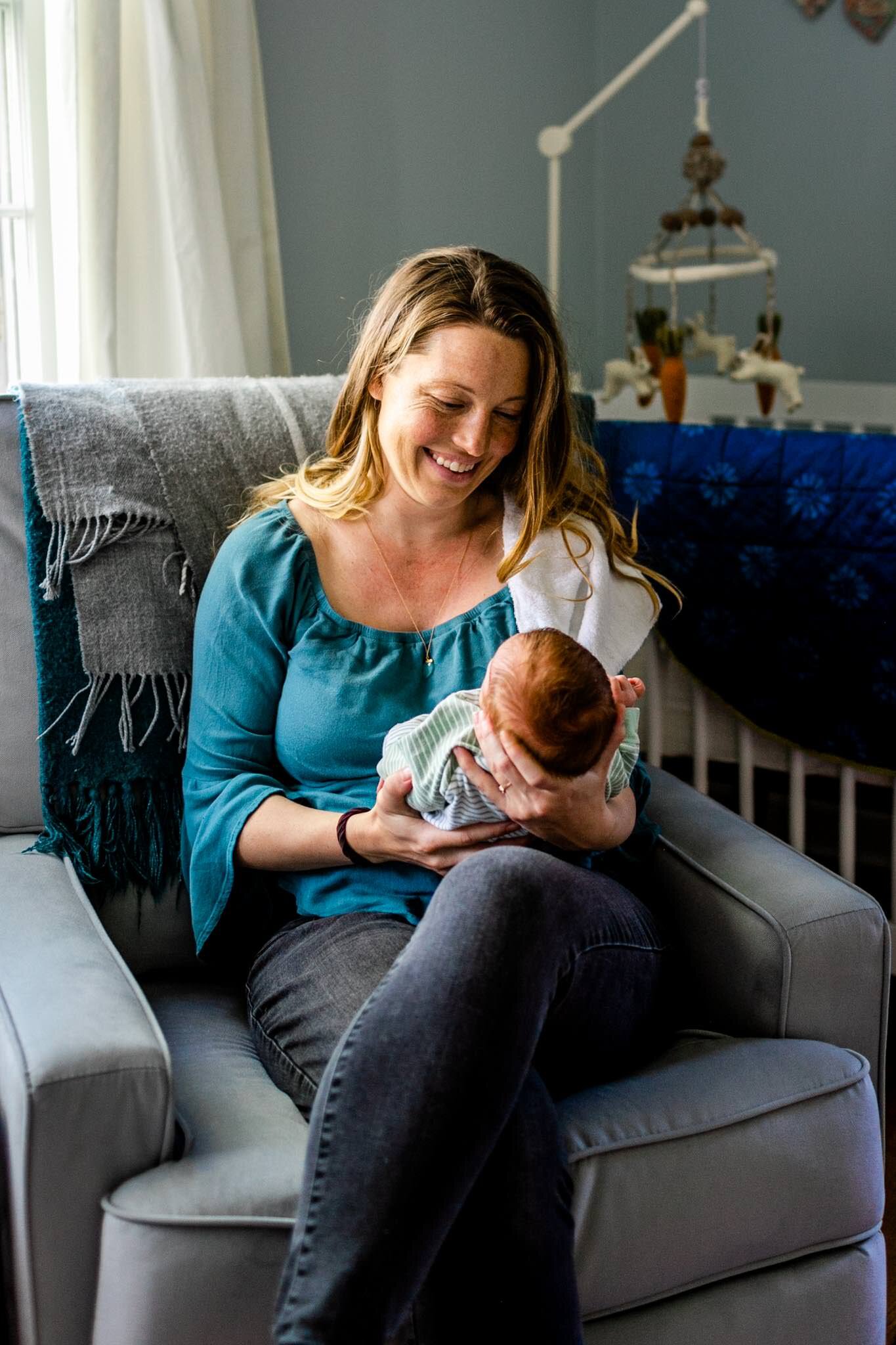 Durham Newborn Photographer | By G. Lin Photography | Mother holding newborn baby