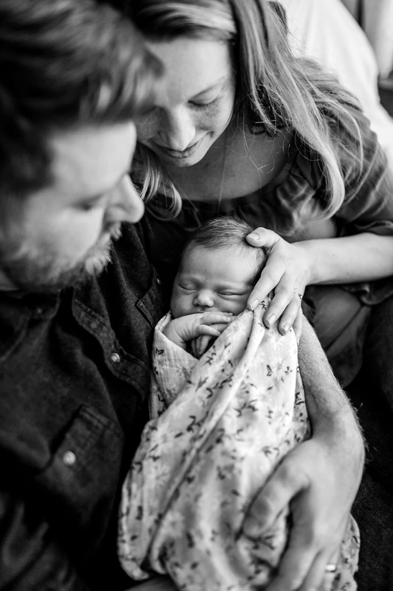 Durham Newborn Photographer | By G. Lin Photography | black and white photo of mom and dad holding baby