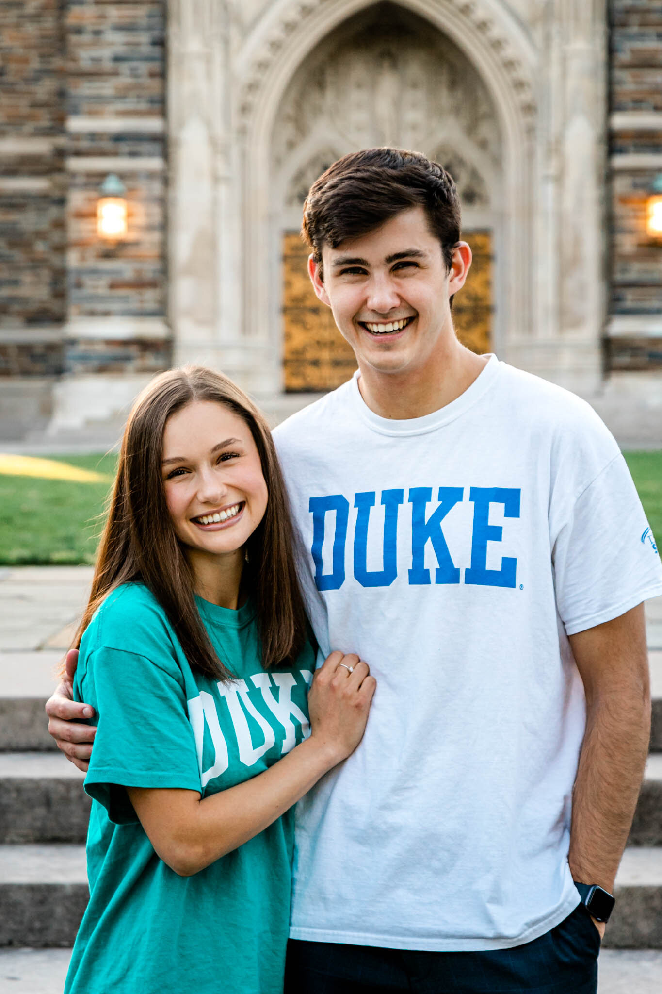 Duke graduates wearing matching shirts in front of Duke Chapel | Duke Senior Photographer | By G. Lin Photography