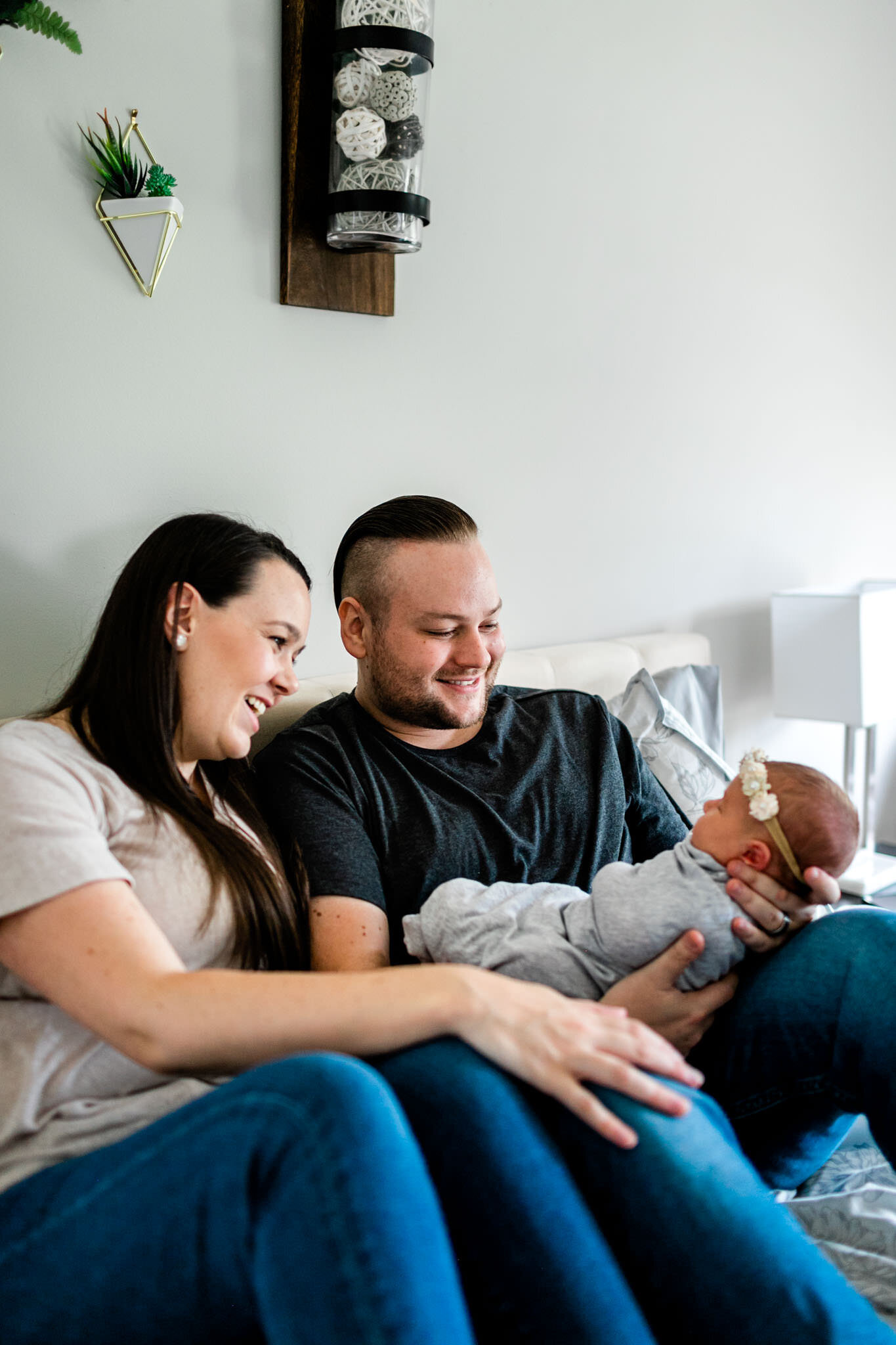 Parents laughing and smiling at new baby girl | Holly Spring Newborn Photographer | By G. Lin Photography