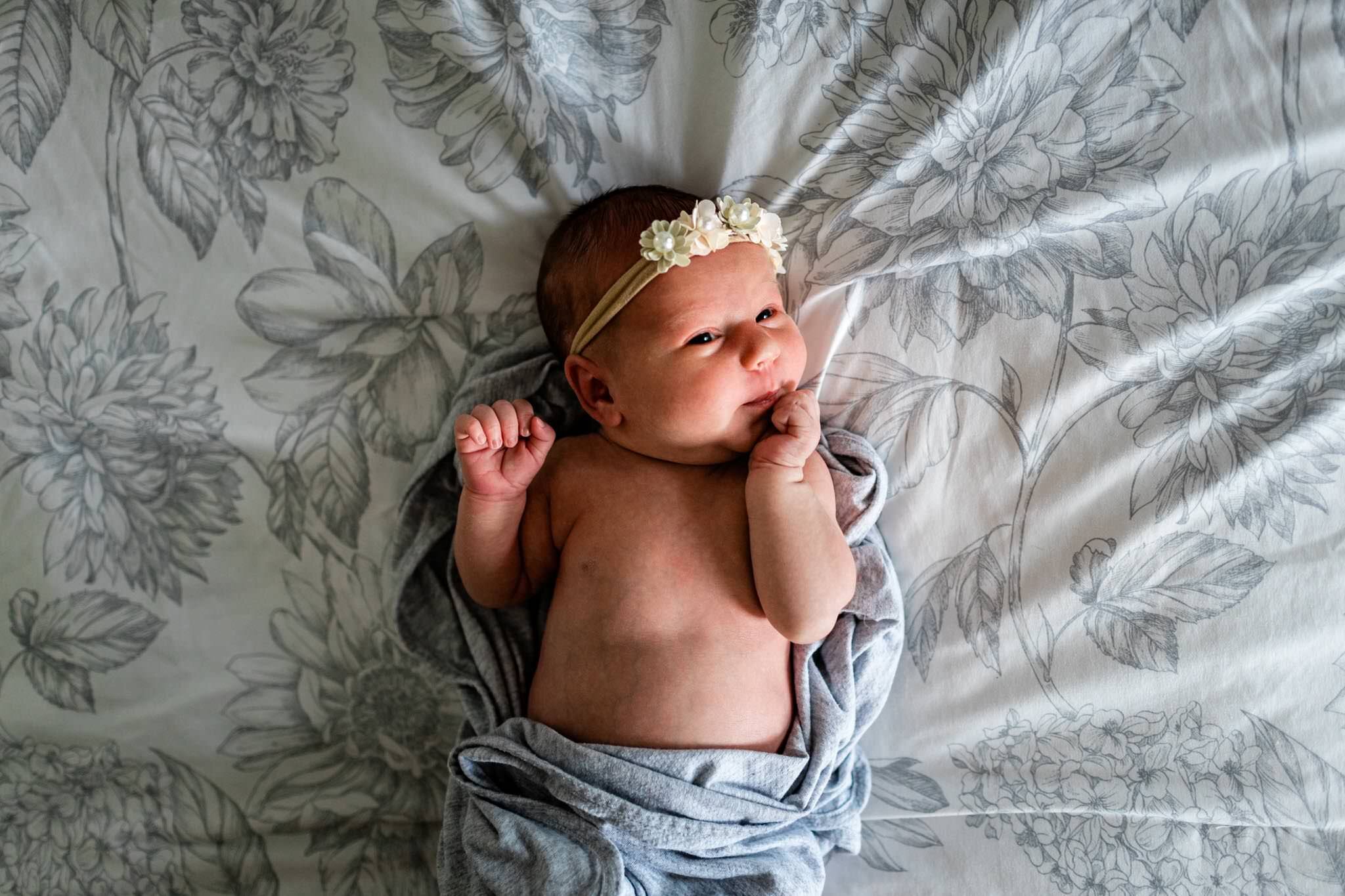 Baby portrait laying on bed | Holly Spring Newborn Photographer | By G. Lin Photography