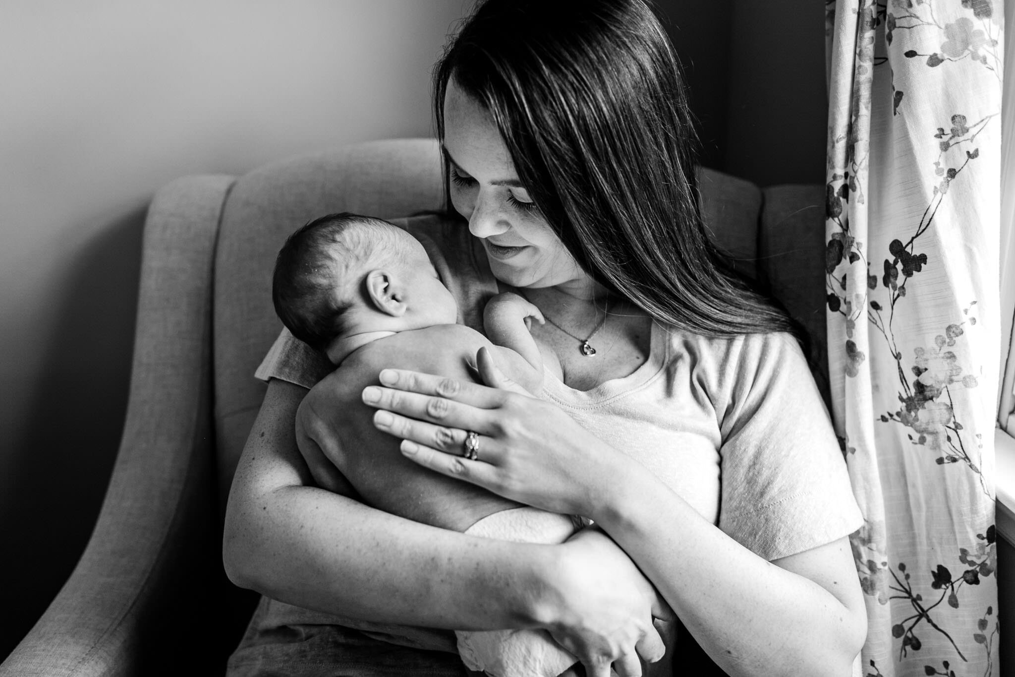 Black and white portrait of mother holding baby | Holly Spring Newborn Photographer | By G. Lin Photography