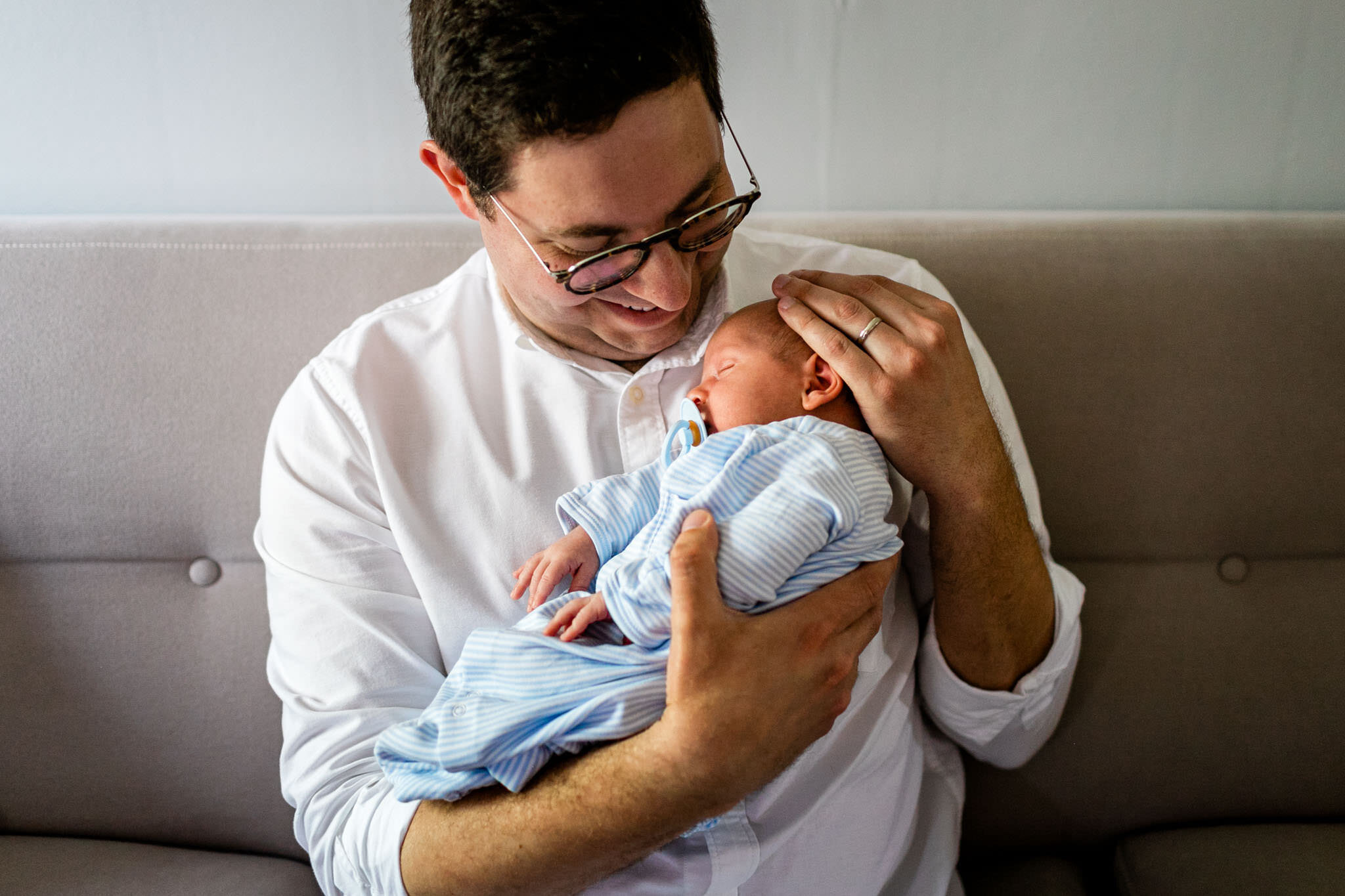 Father holding baby | Greensboro Newborn Photographer | By G. Lin Photography