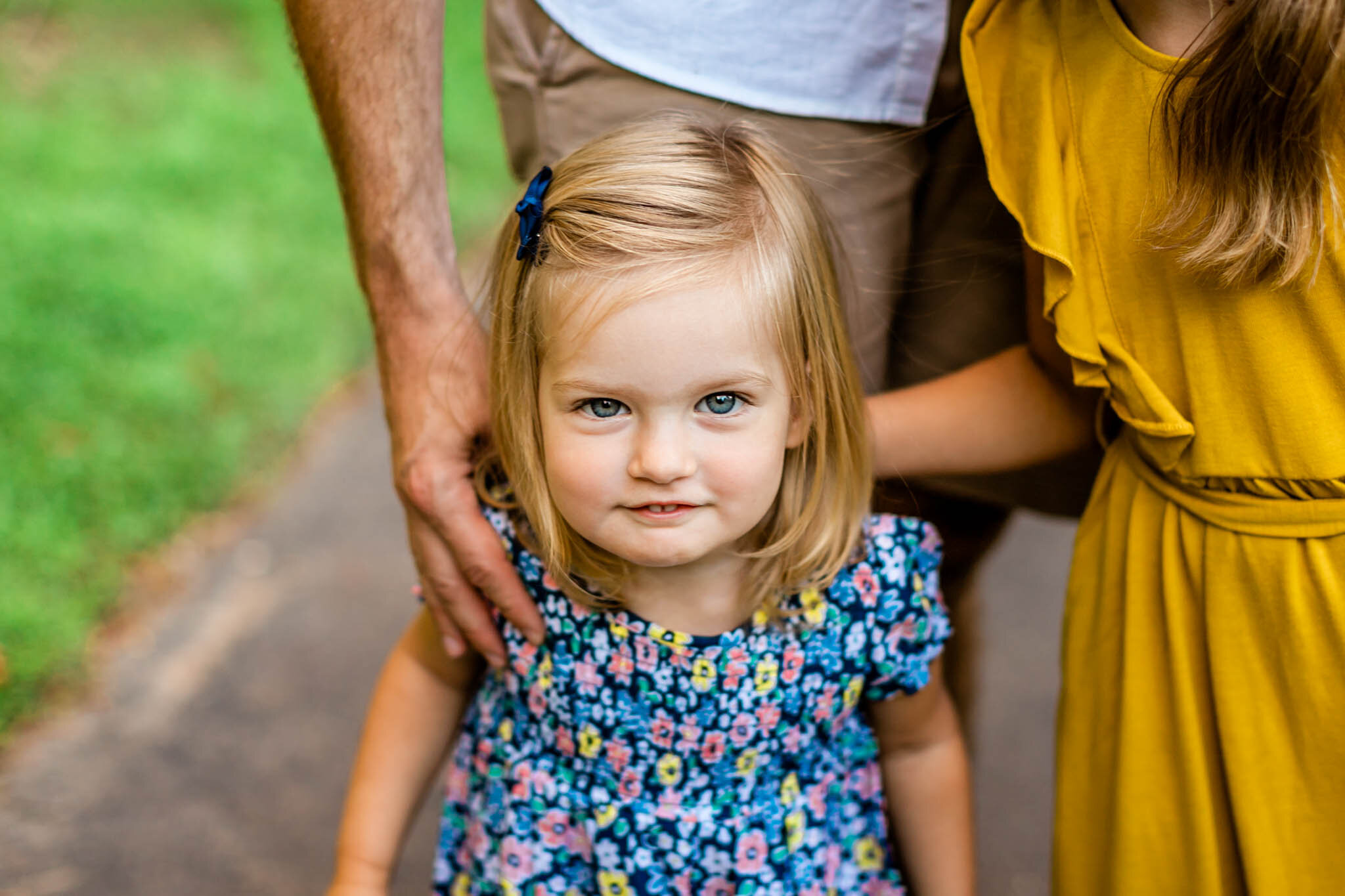Close up shot of toddler girl smiling at camera | Cary Family Photographer | By G. Lin Photography