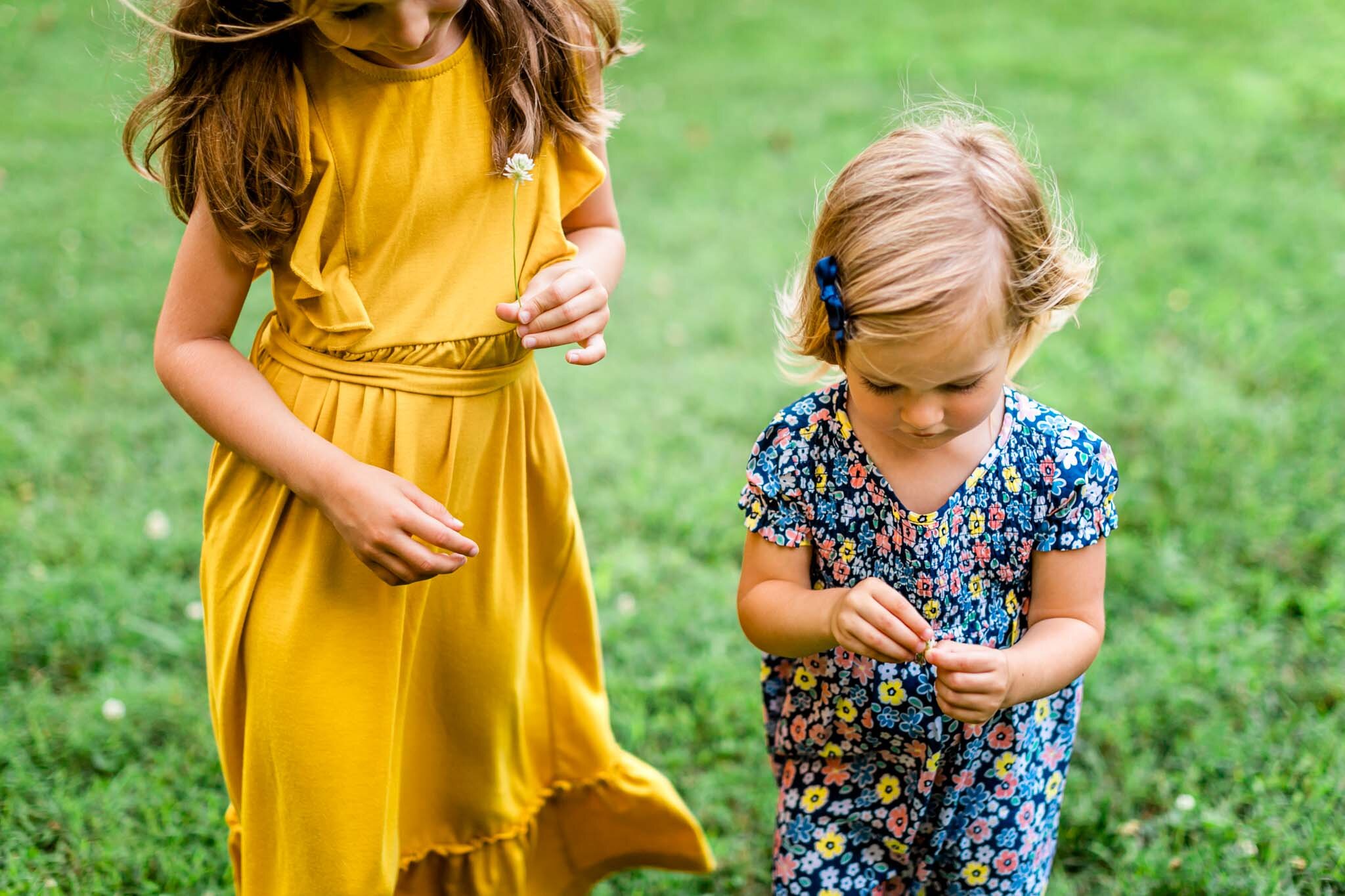 Two girls picking flowers | Cary Family Photographer | By G. Lin Photography