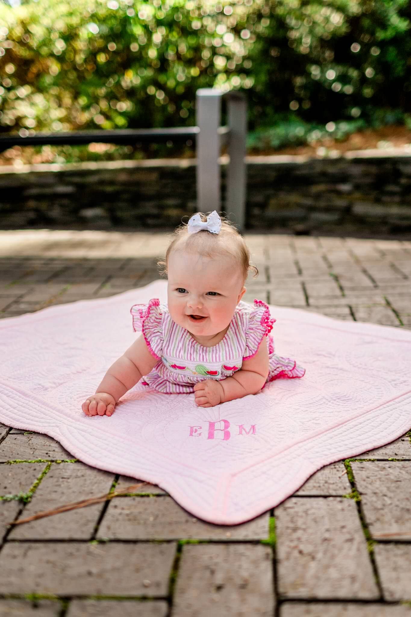 Baby girl smiling and doing tummy time | Raleigh Family Photographer | By G. Lin Photography | WRAL Azalea Garden