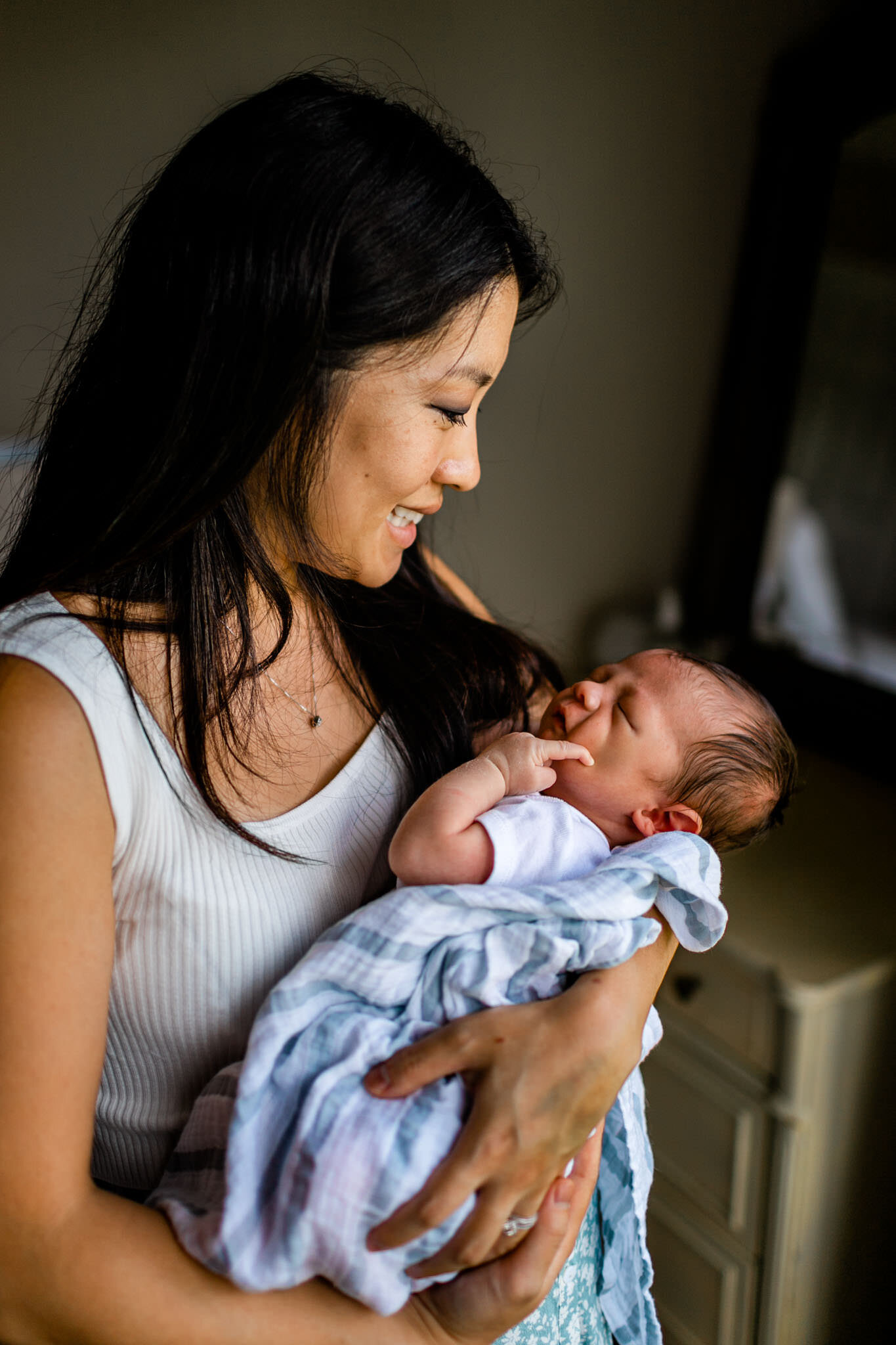 Mother holding baby boy | Durham Newborn Photographer | By G. Lin Photography