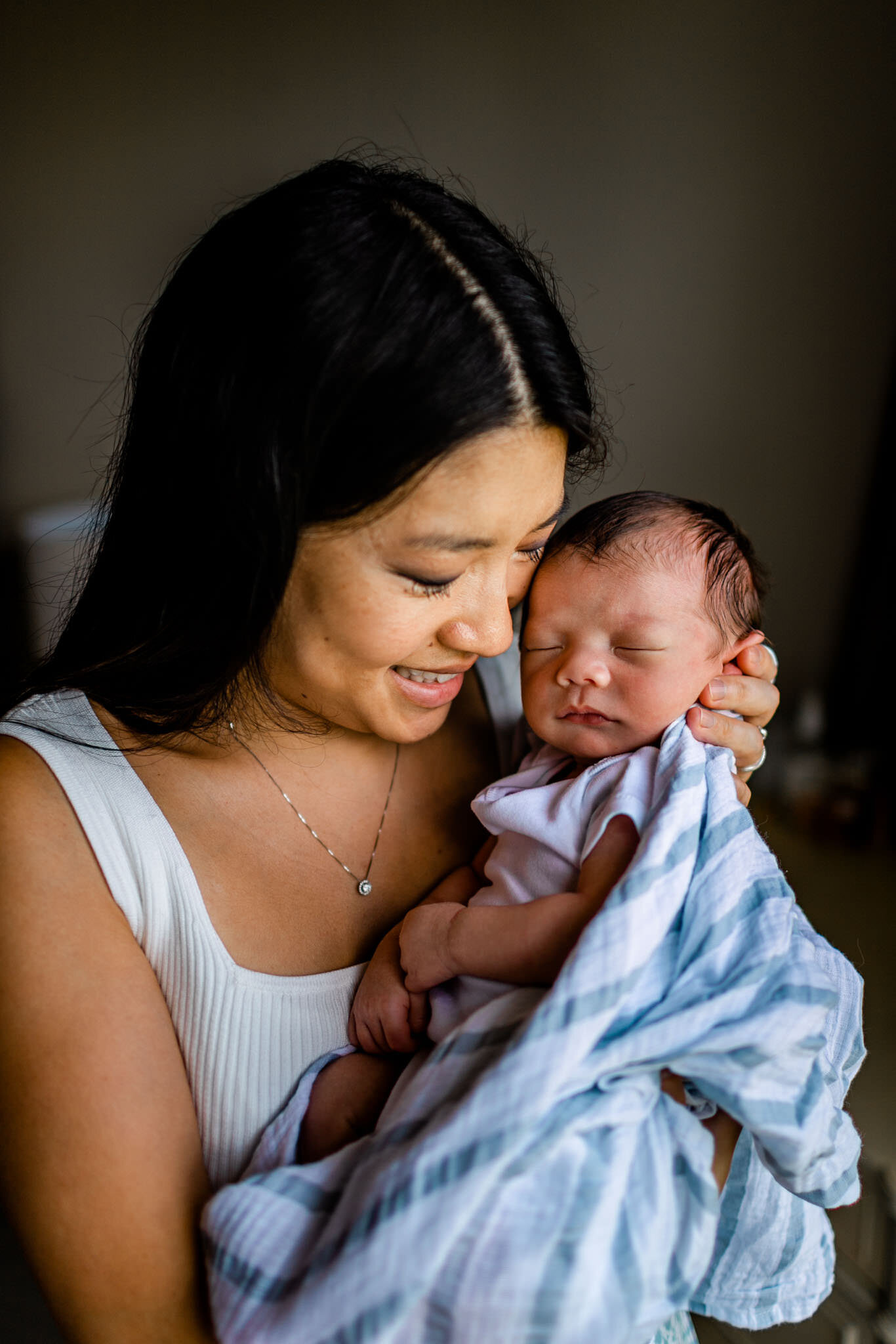 Beautiful portrait of mom holding baby boy | Durham Newborn Photographer | By G. Lin Photography